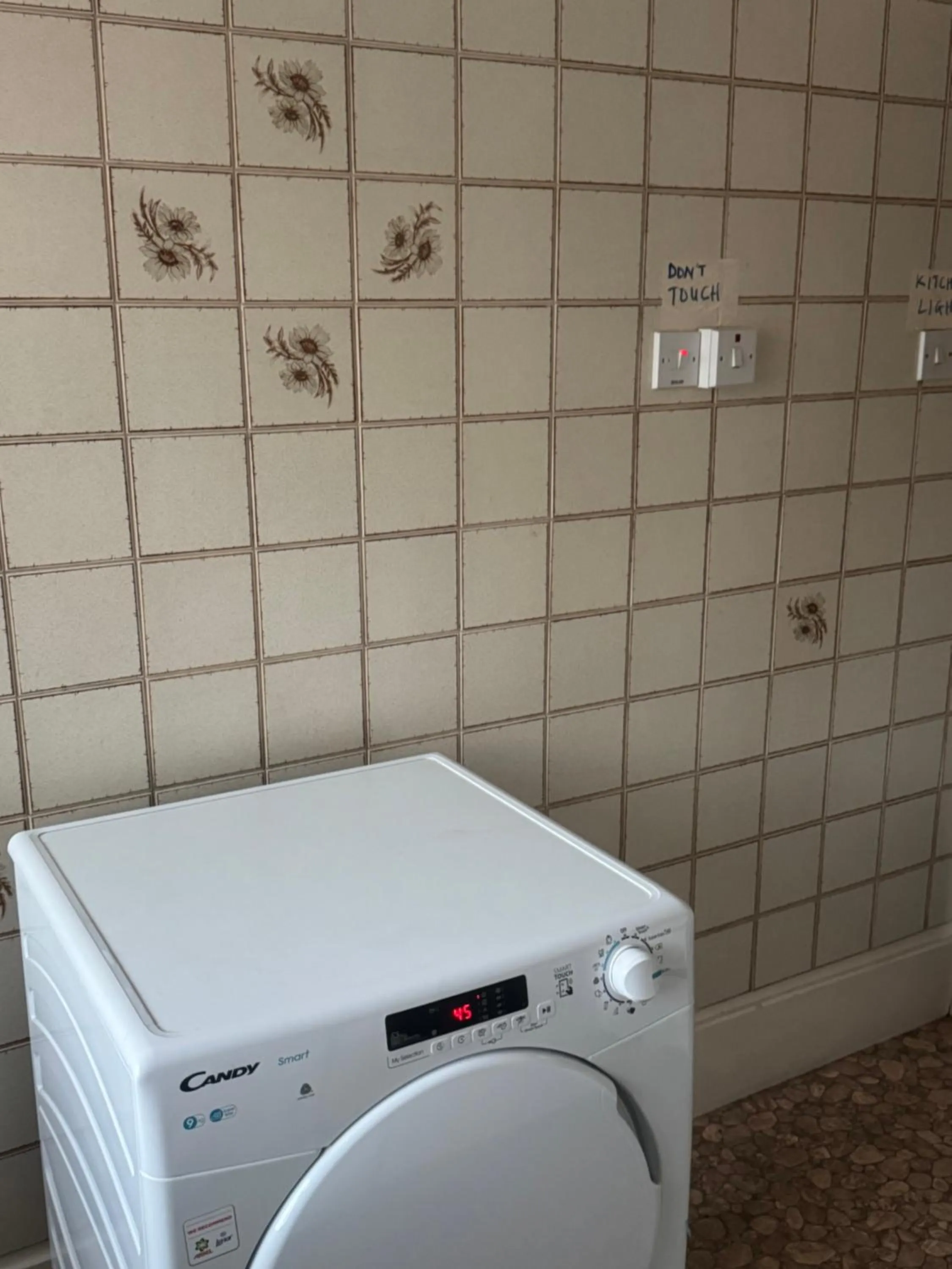 washing machine in Komegloba Exquisite room