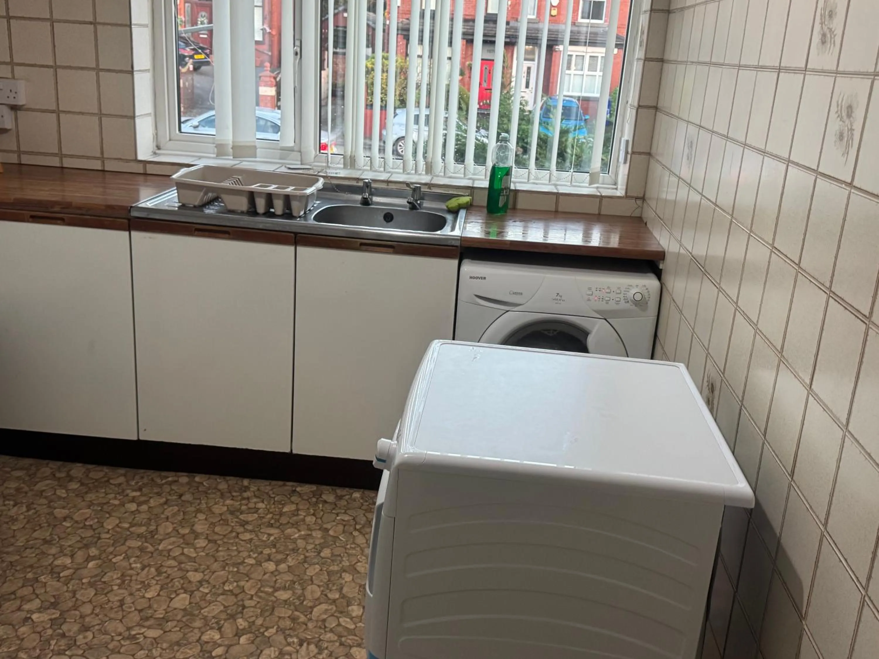 Kitchen or kitchenette in Komegloba Exquisite room