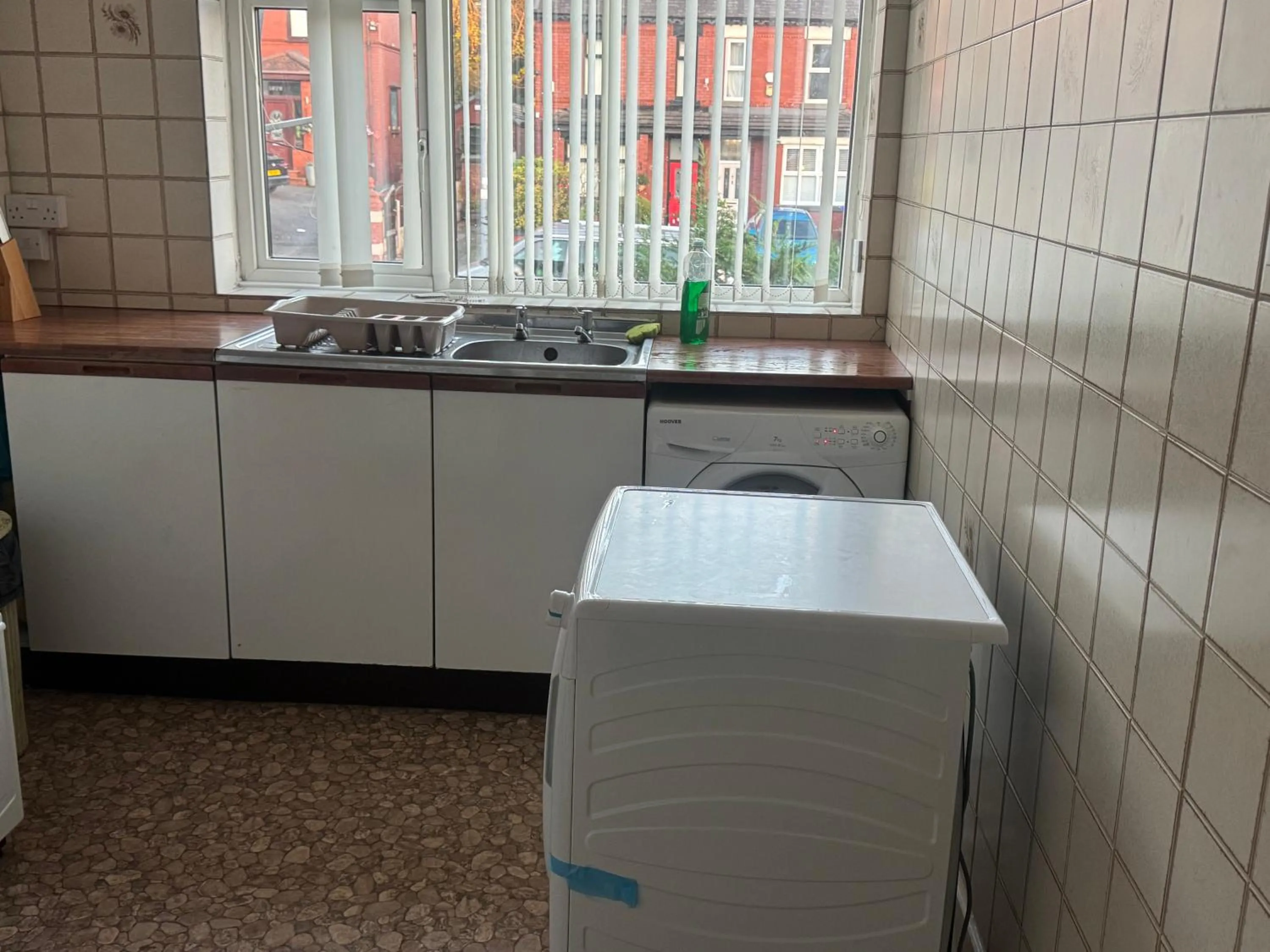 Kitchen or kitchenette in Komegloba Exquisite room