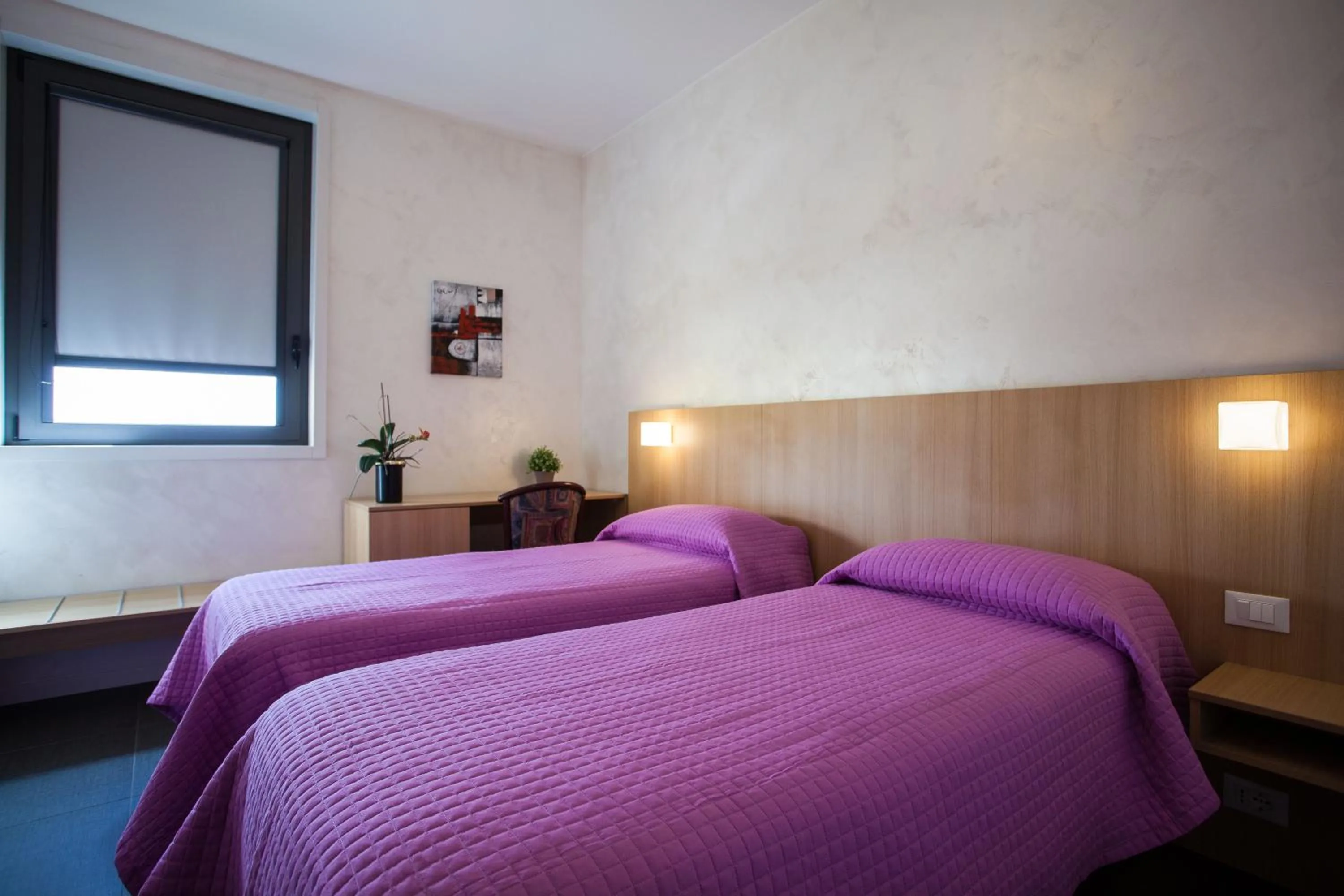 Bed in Hotel La Tavernetta