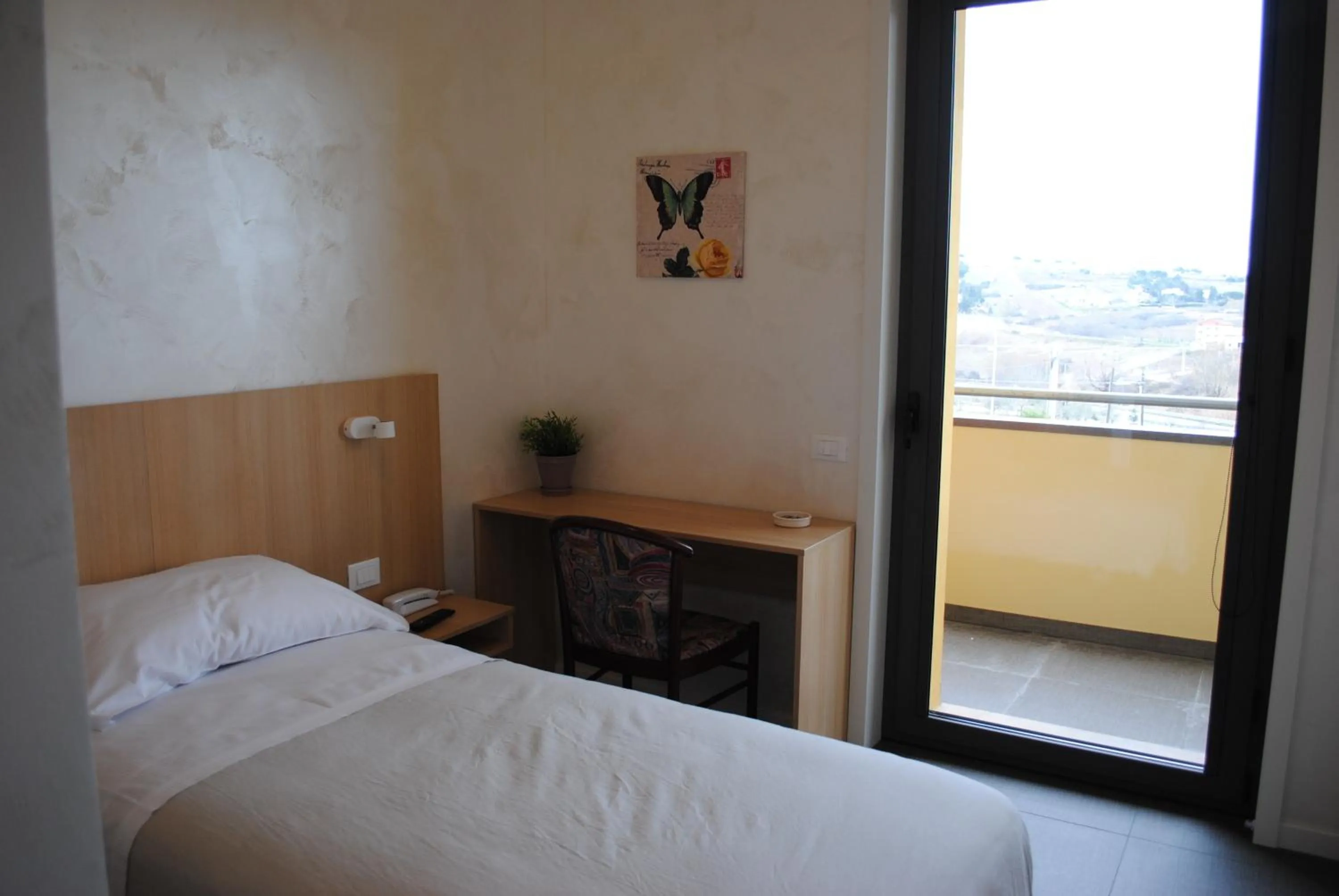 Bedroom, Bed in Hotel La Tavernetta