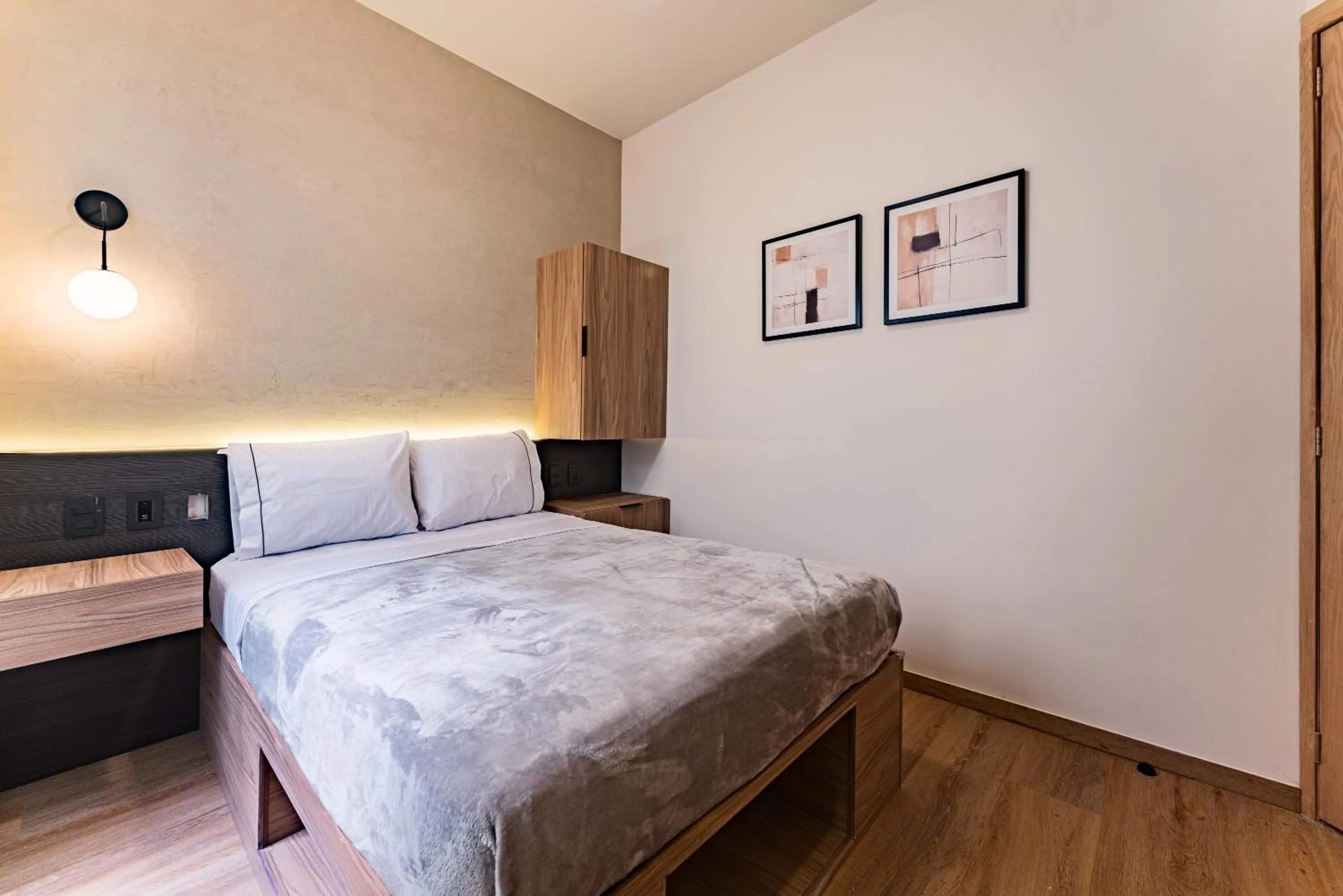 Bed in Suites Monterrey by Escajal Rooms