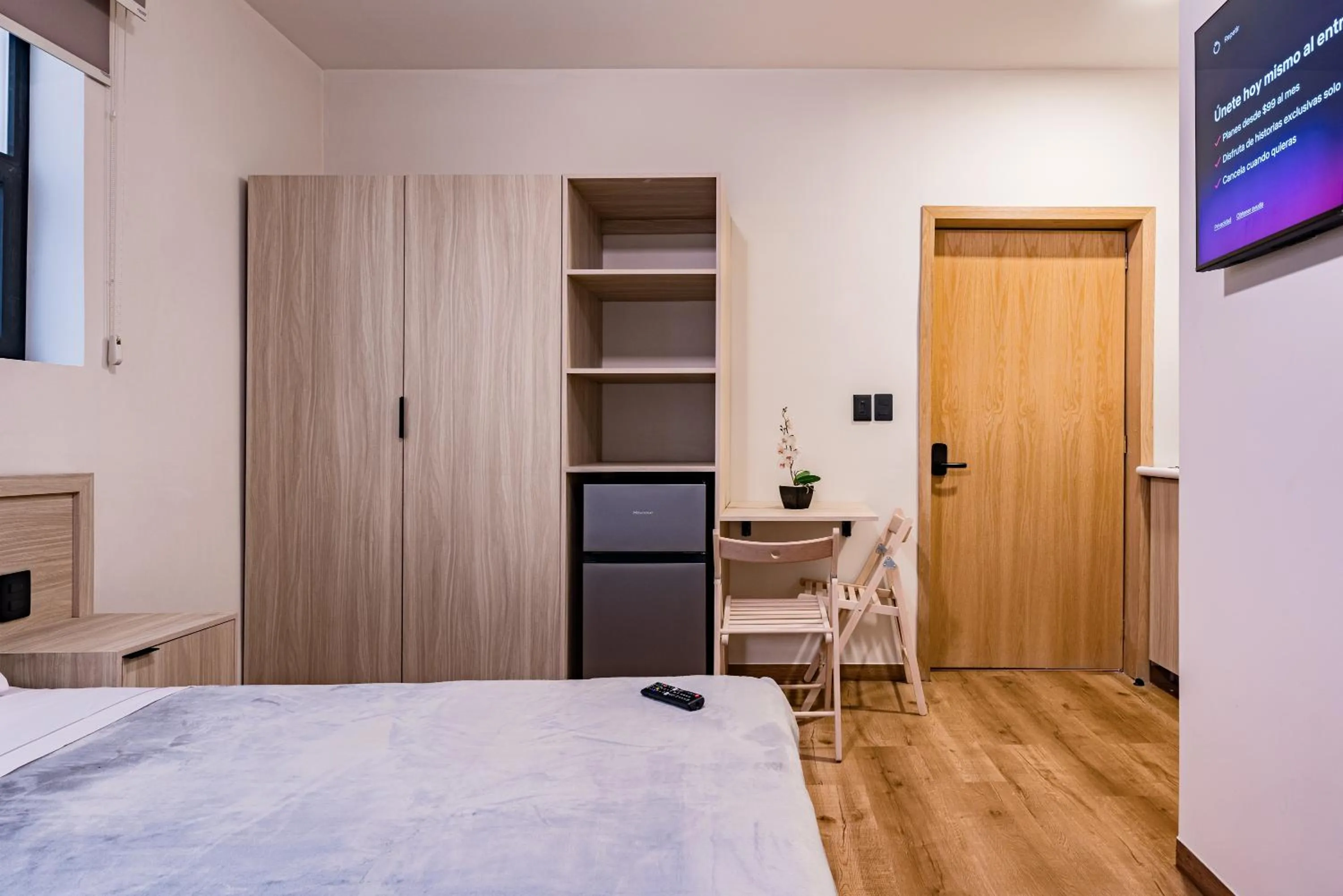 Bed in Suites Monterrey by Escajal Rooms