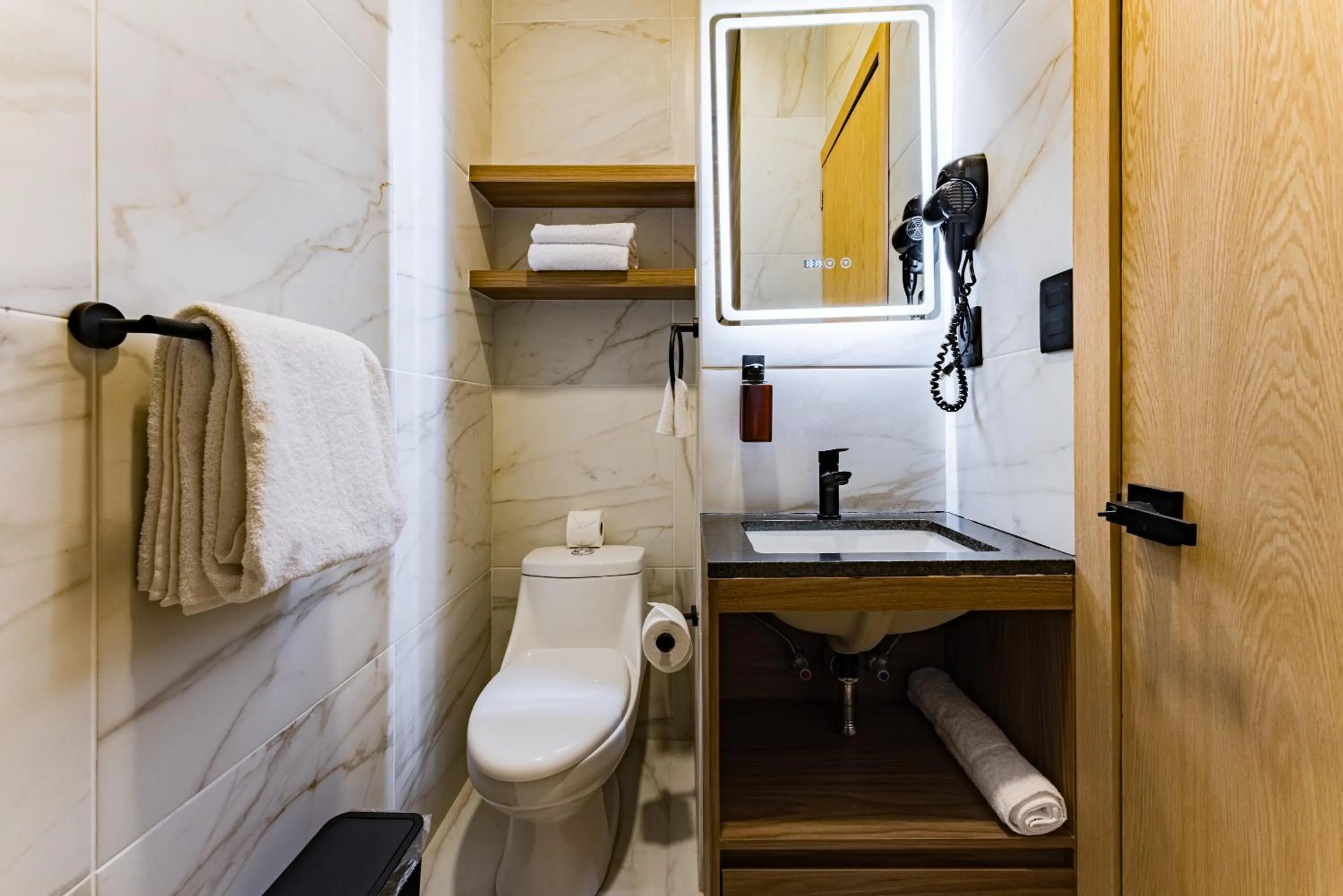 Shower in Suites Monterrey by Escajal Rooms