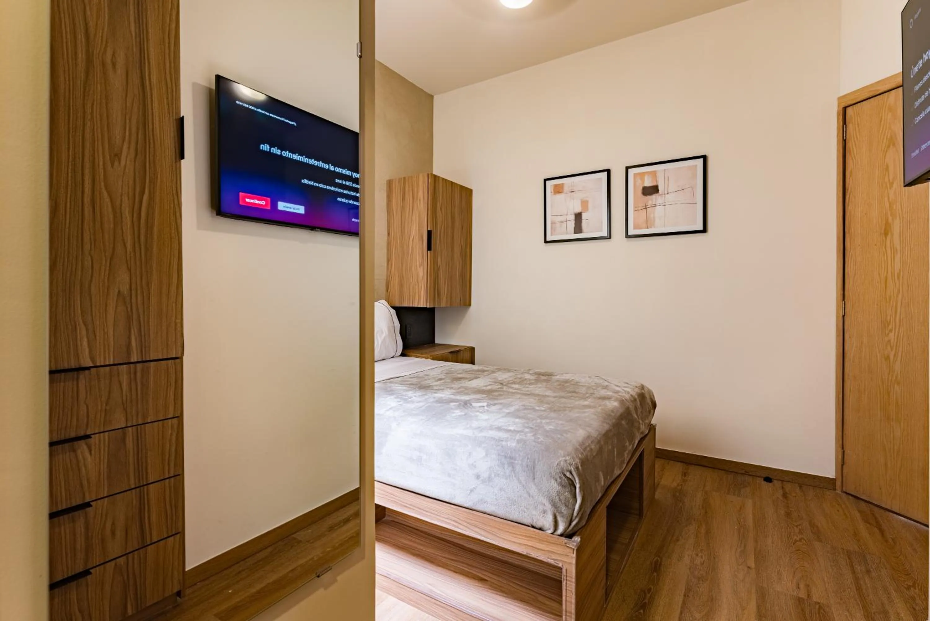 Bed in Suites Monterrey by Escajal Rooms