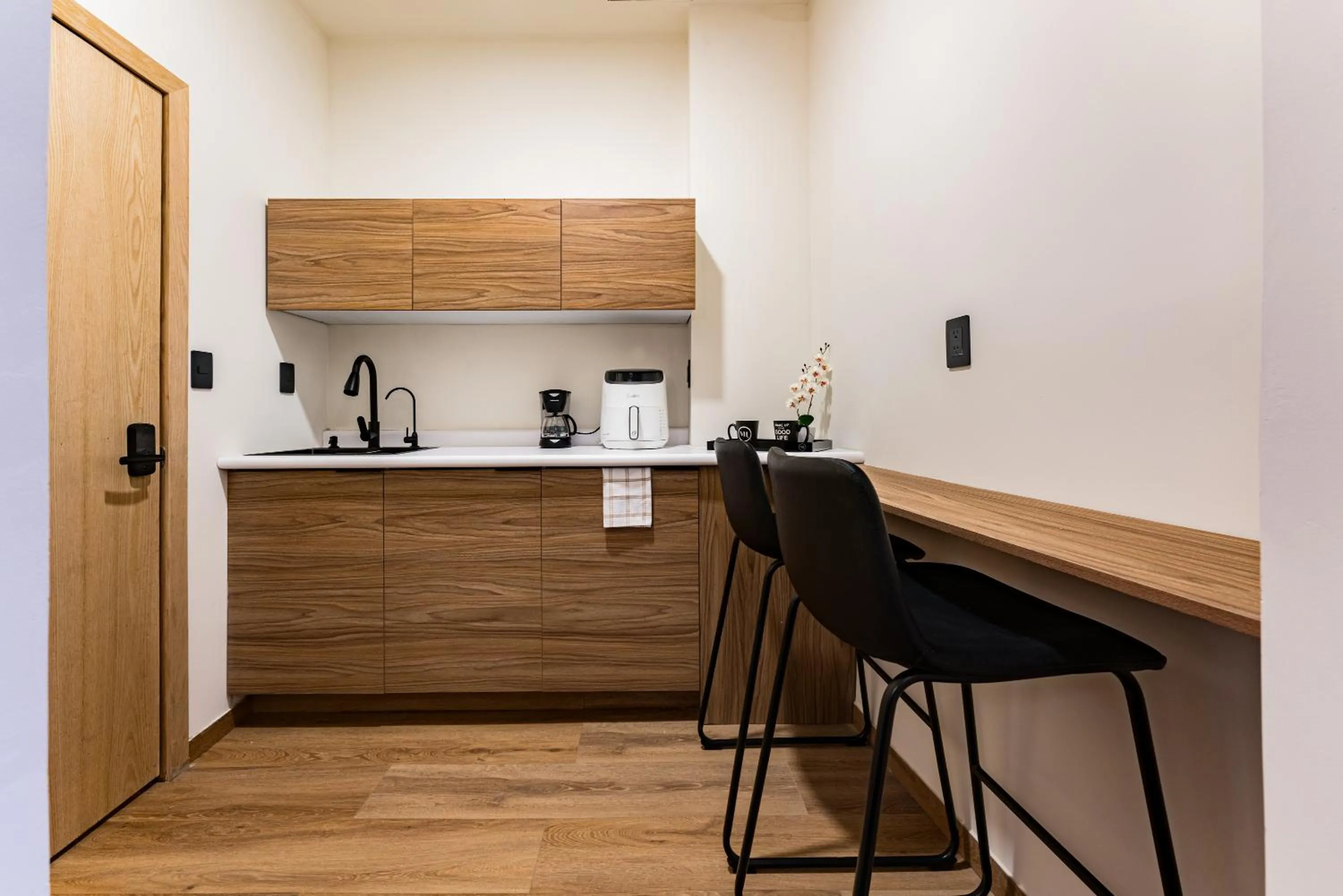 Kitchen or kitchenette in Suites Monterrey by Escajal Rooms