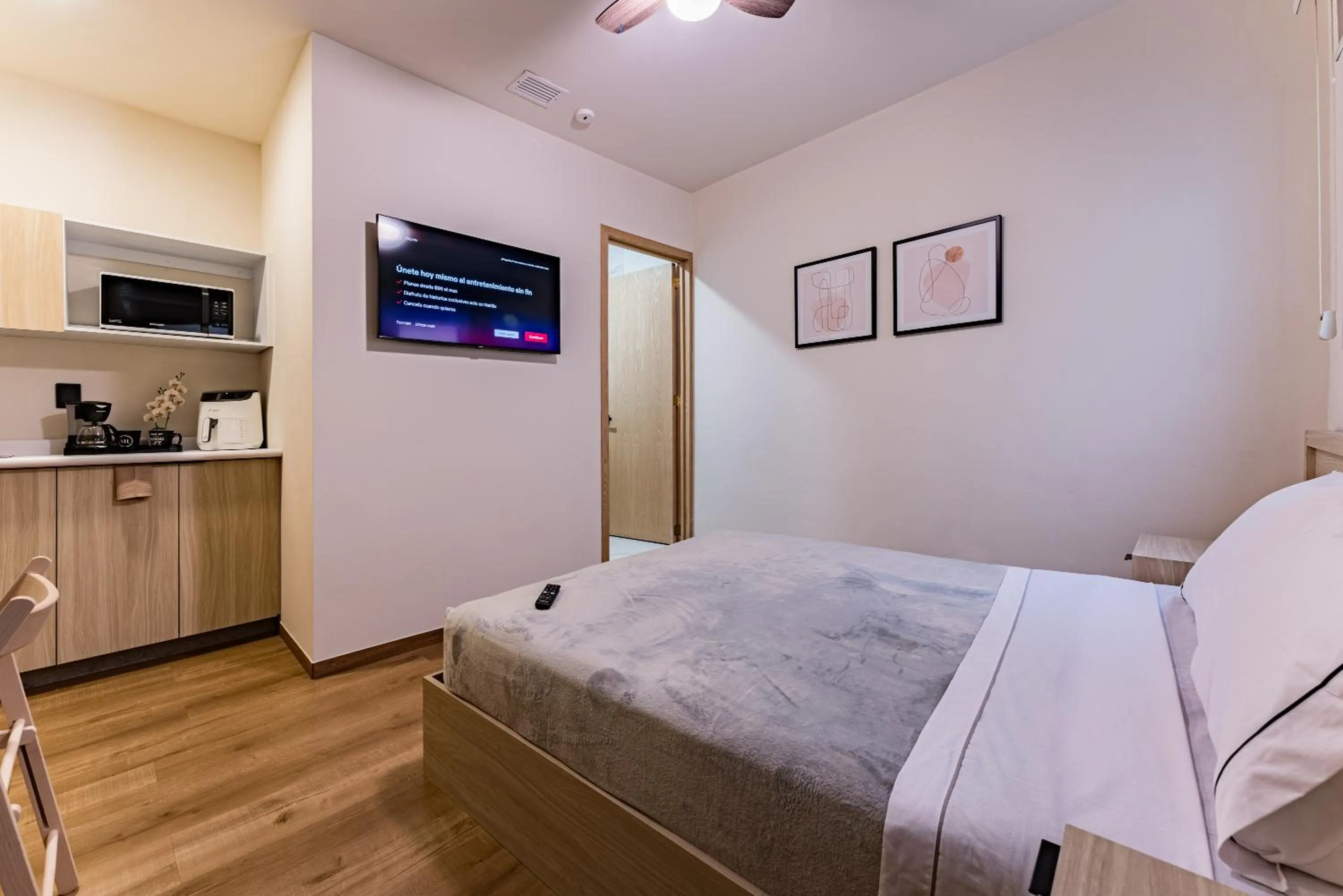 Bed in Suites Monterrey by Escajal Rooms