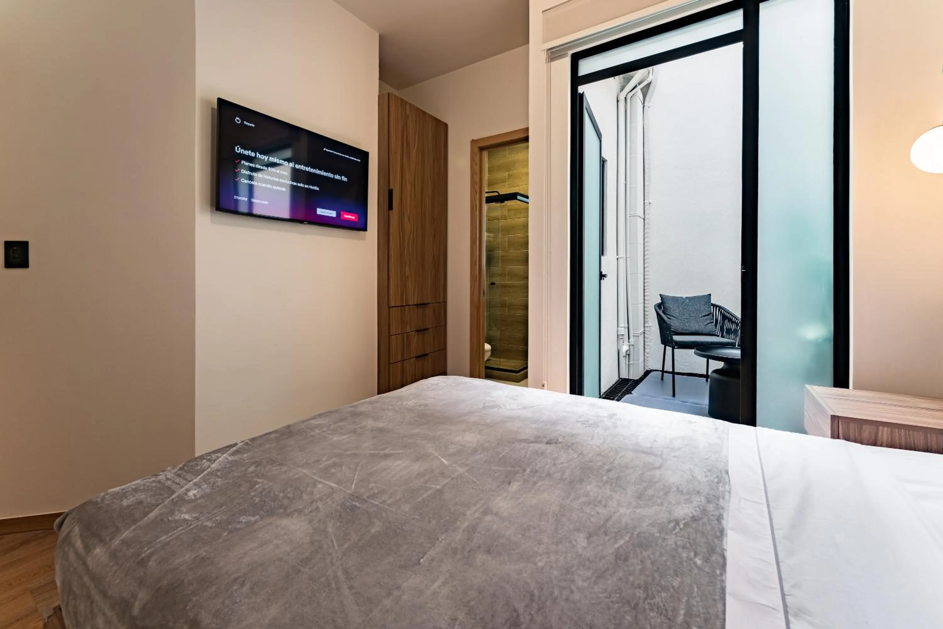 Bed in Suites Monterrey by Escajal Rooms