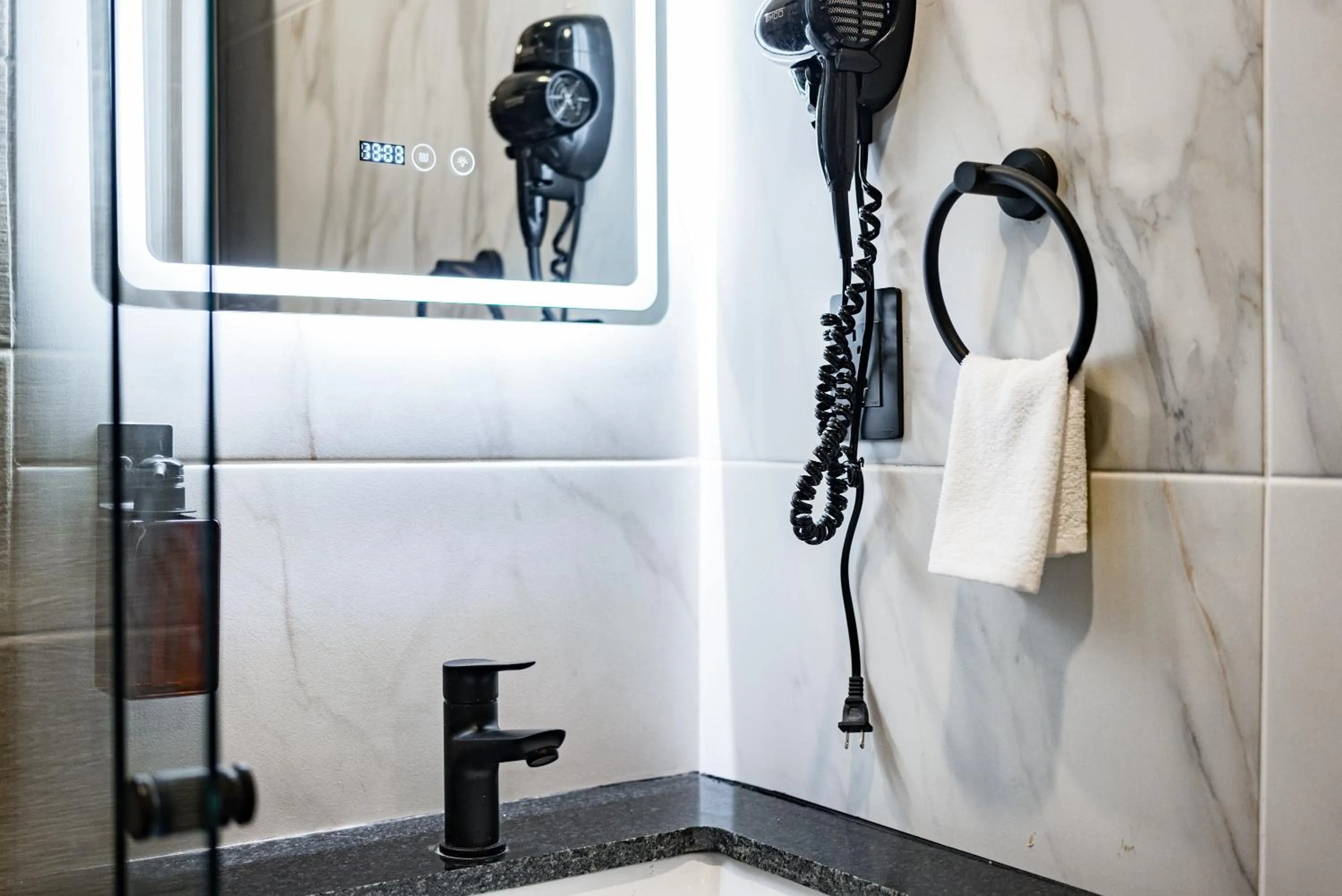 Shower in Suites Monterrey by Escajal Rooms