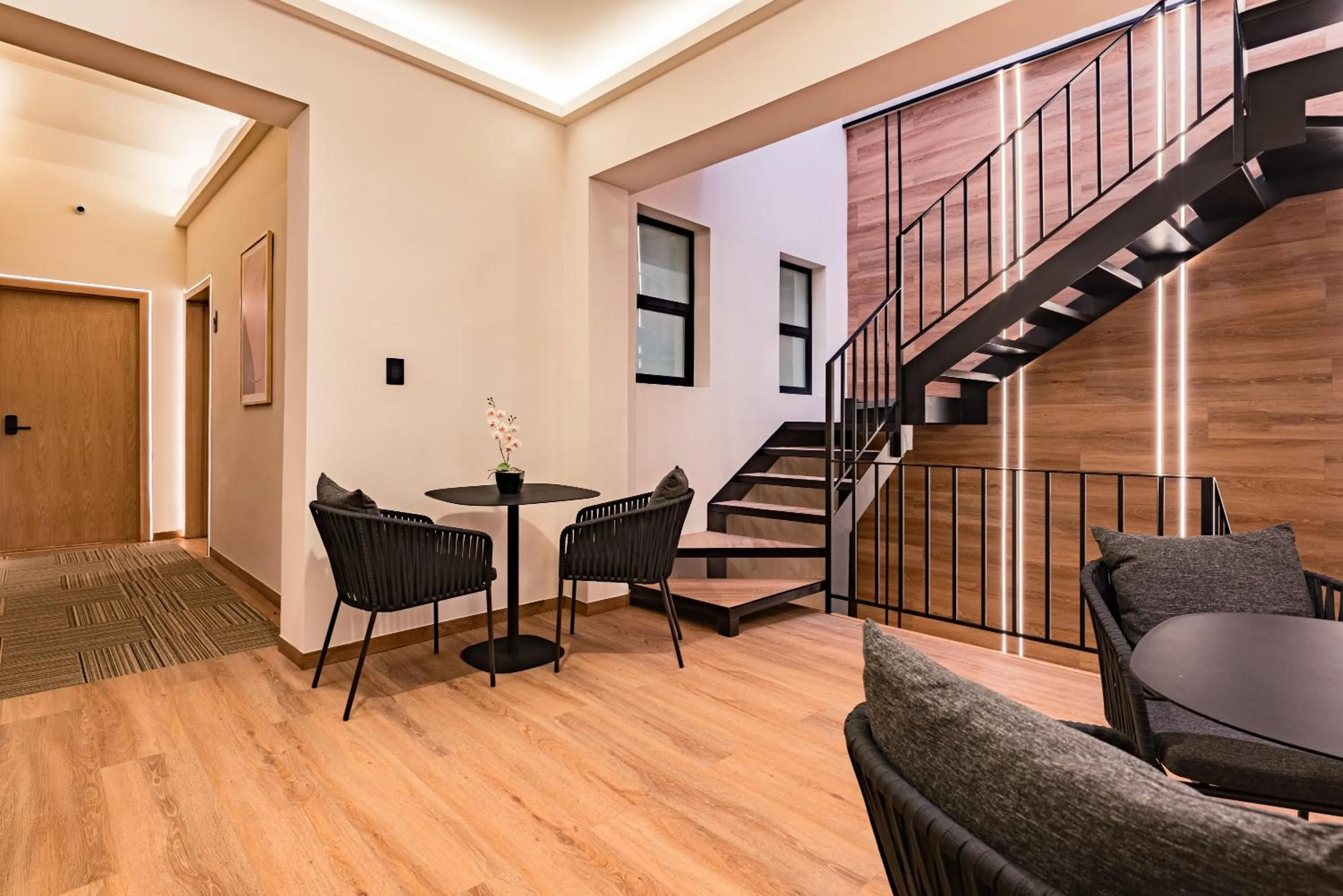 Living room in Suites Monterrey by Escajal Rooms