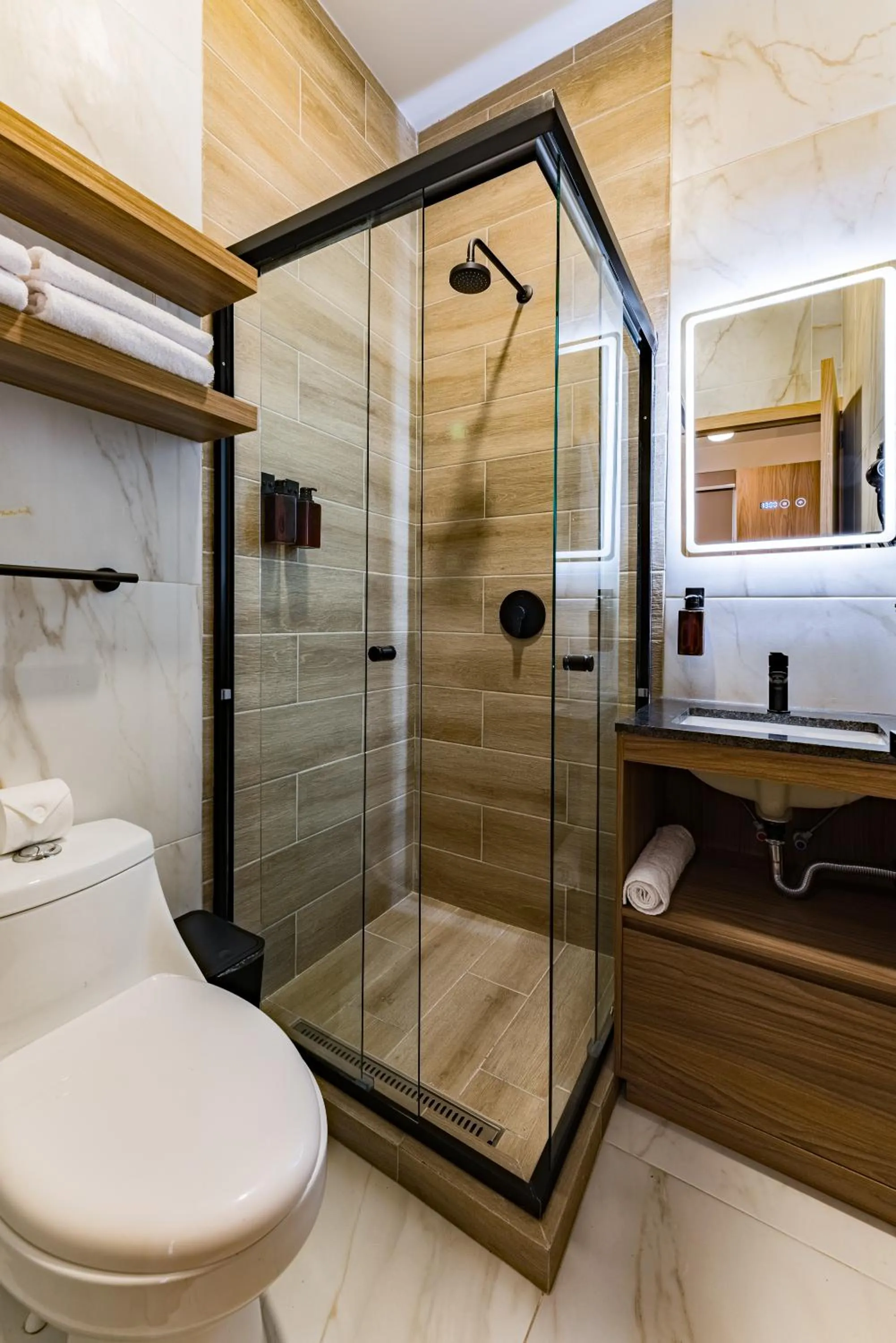 Shower in Suites Monterrey by Escajal Rooms