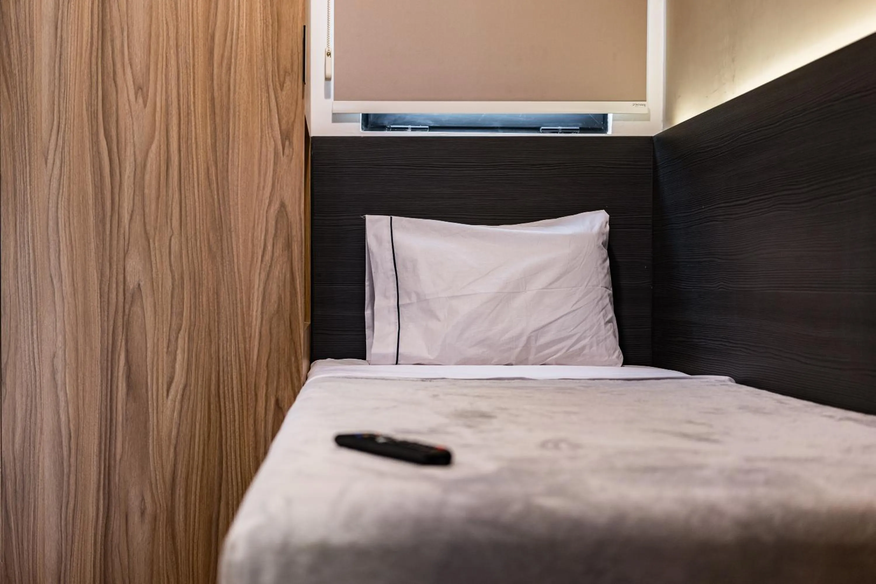 Bed in Suites Monterrey by Escajal Rooms