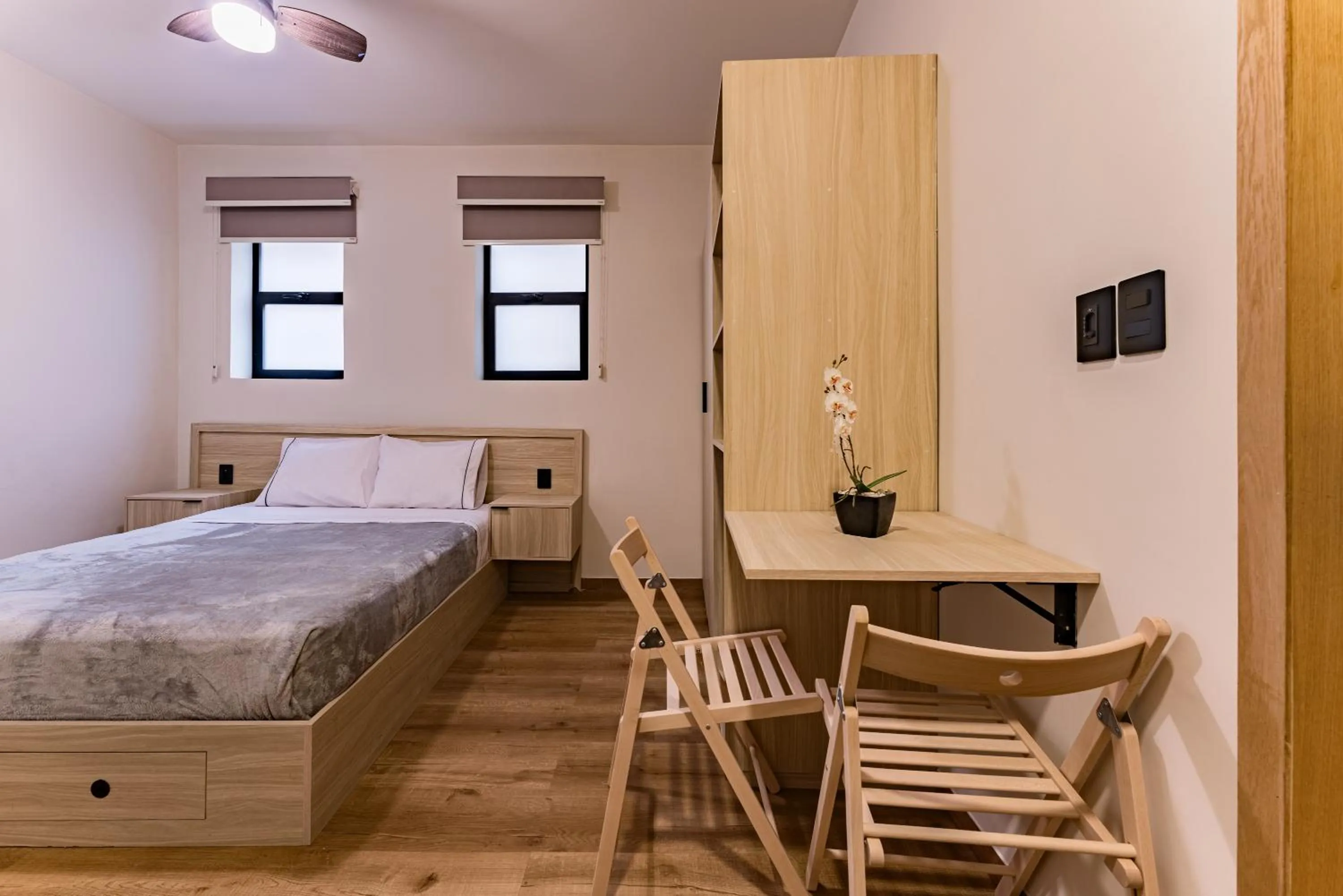 Bed in Suites Monterrey by Escajal Rooms