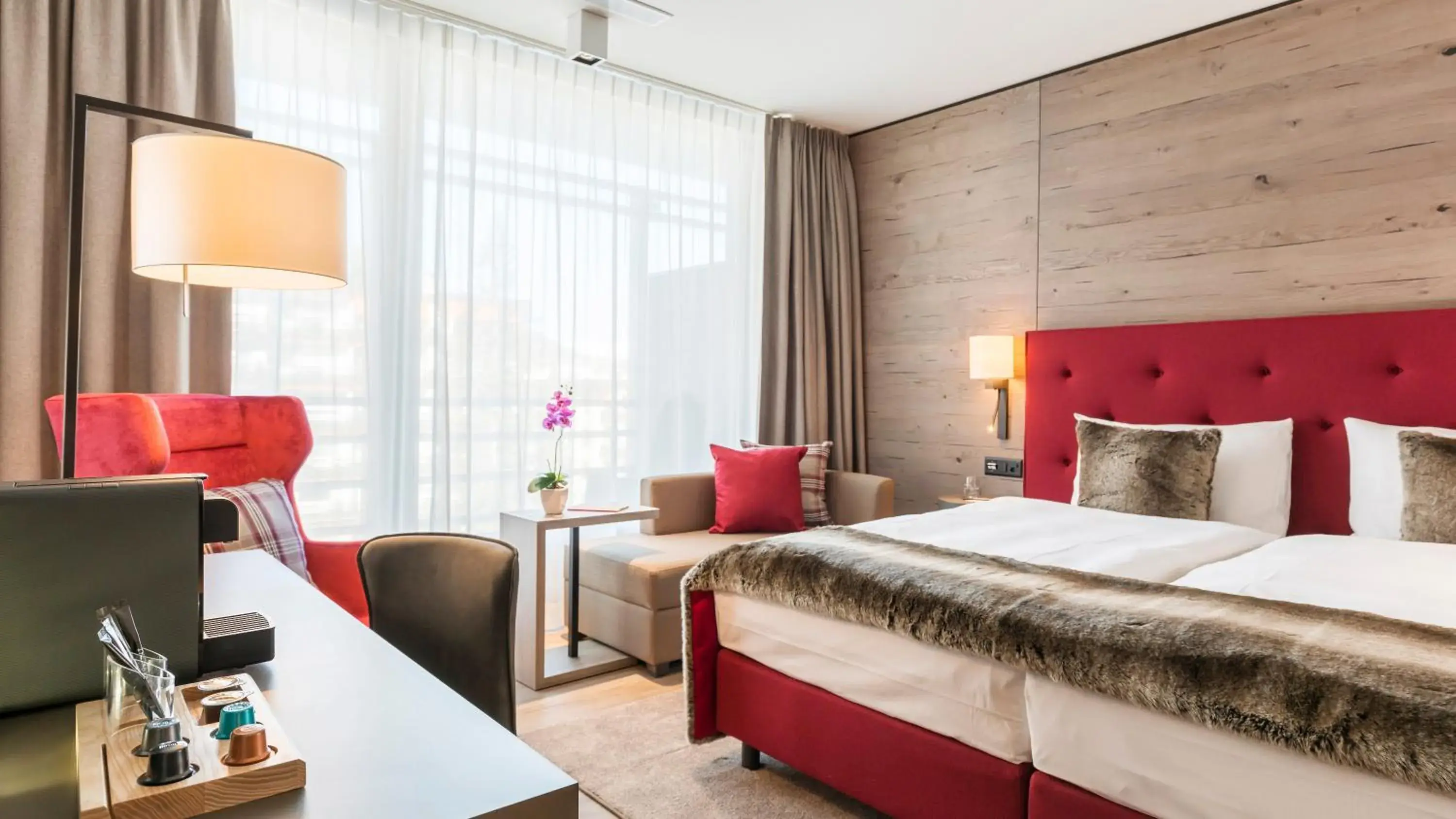 Bed in AMERON Davos Swiss Mountain Resort Bed in AMERON Davos Swiss Mountain Resort