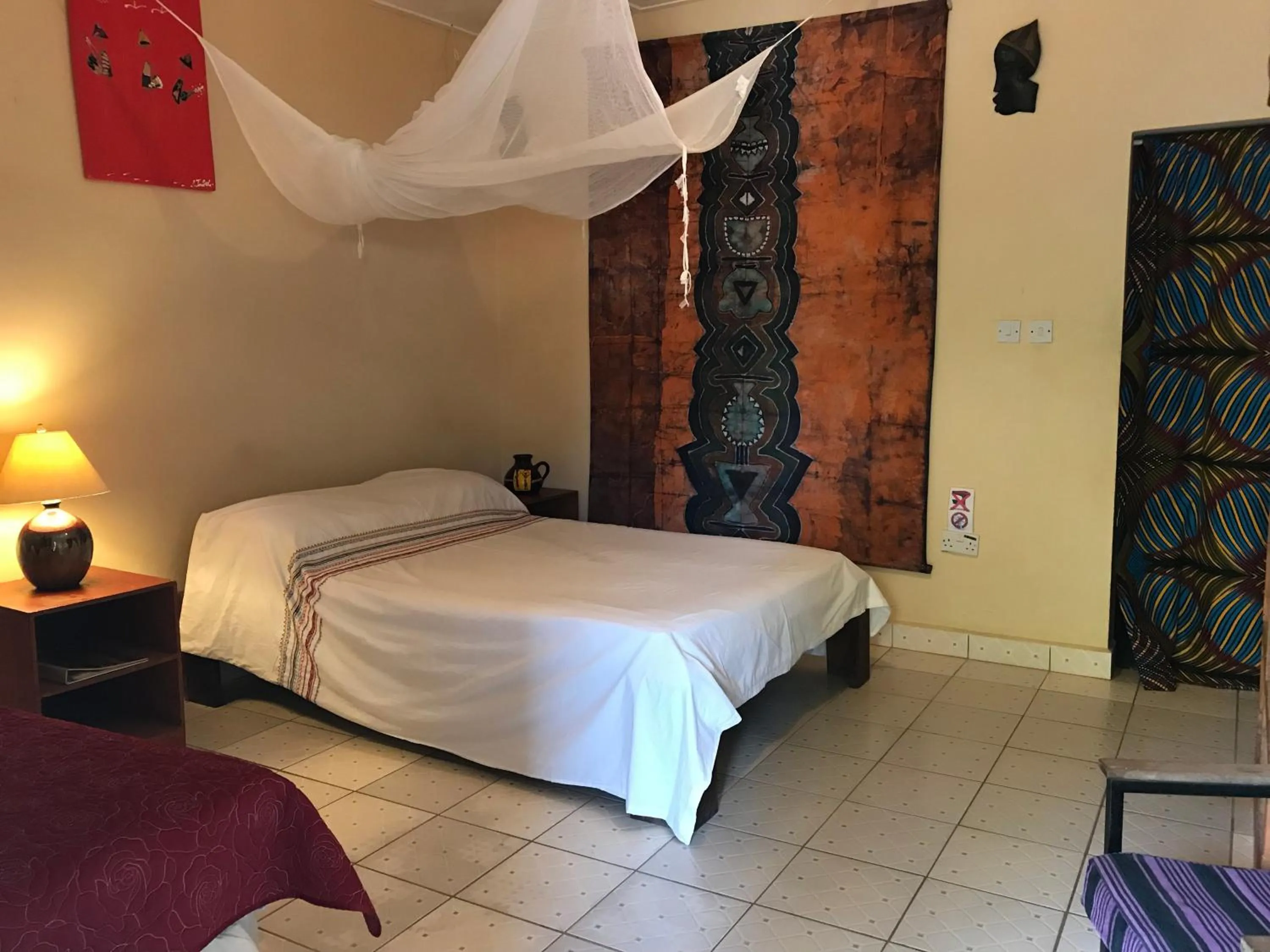 Bed in The Gunjur Project Lodge