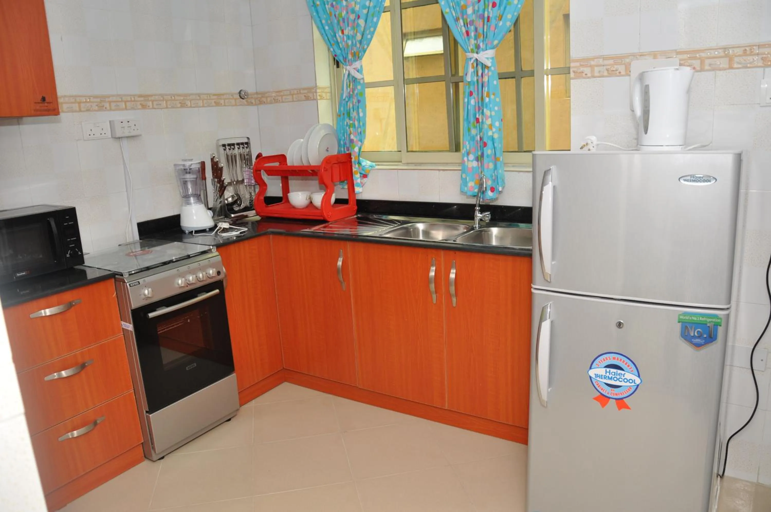 Kitchen or kitchenette in VTL Suites