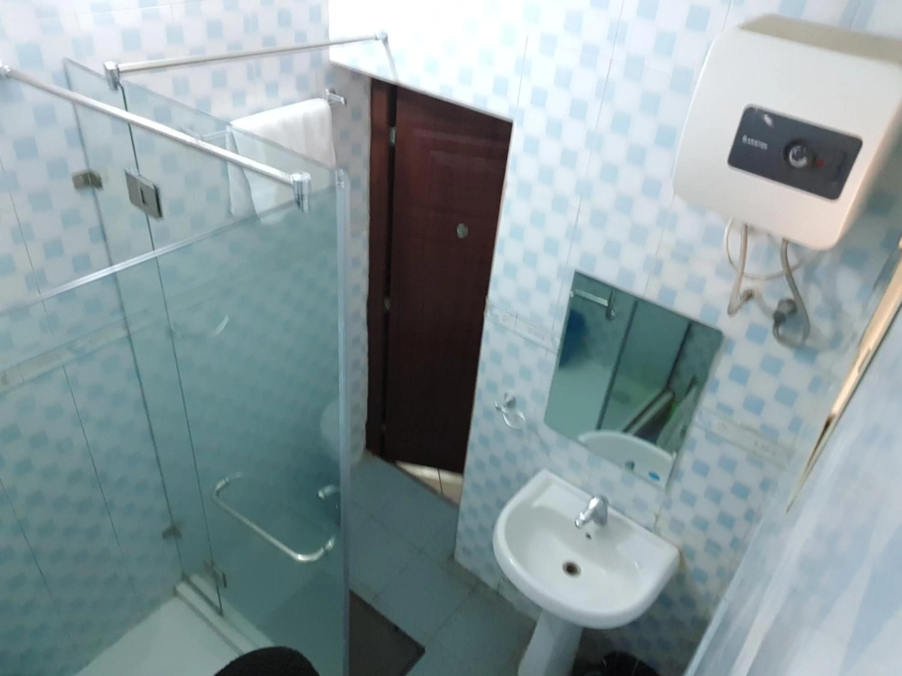 Bathroom in VTL Suites