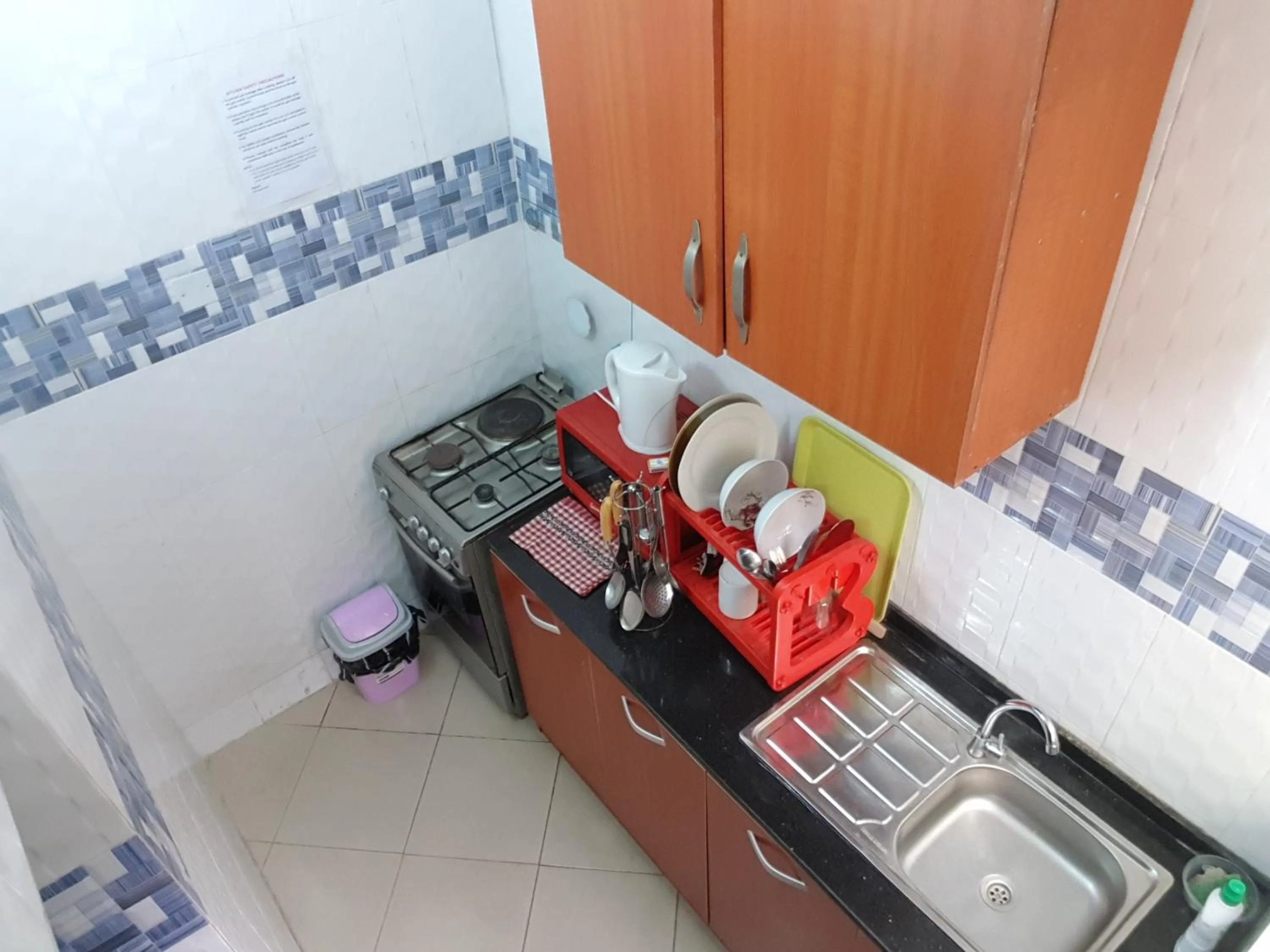 Kitchen or kitchenette in VTL Suites
