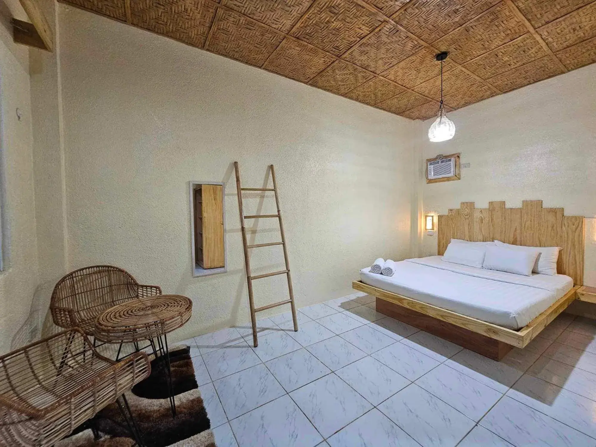 Bed in Acacia Sunset Village Inn Bed in Acacia Sunset Village Inn