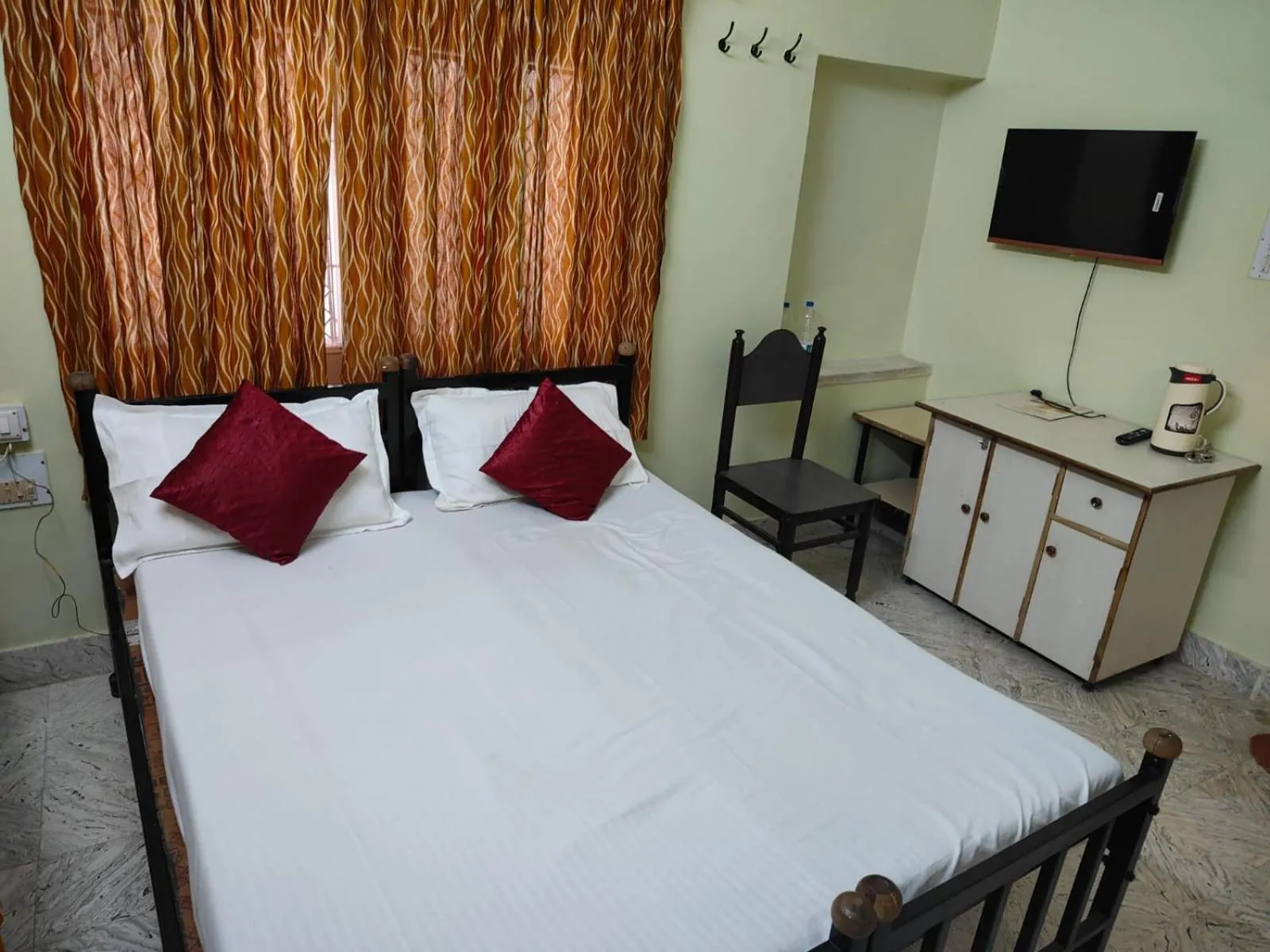 Bed in Hotel Jamna Vilas