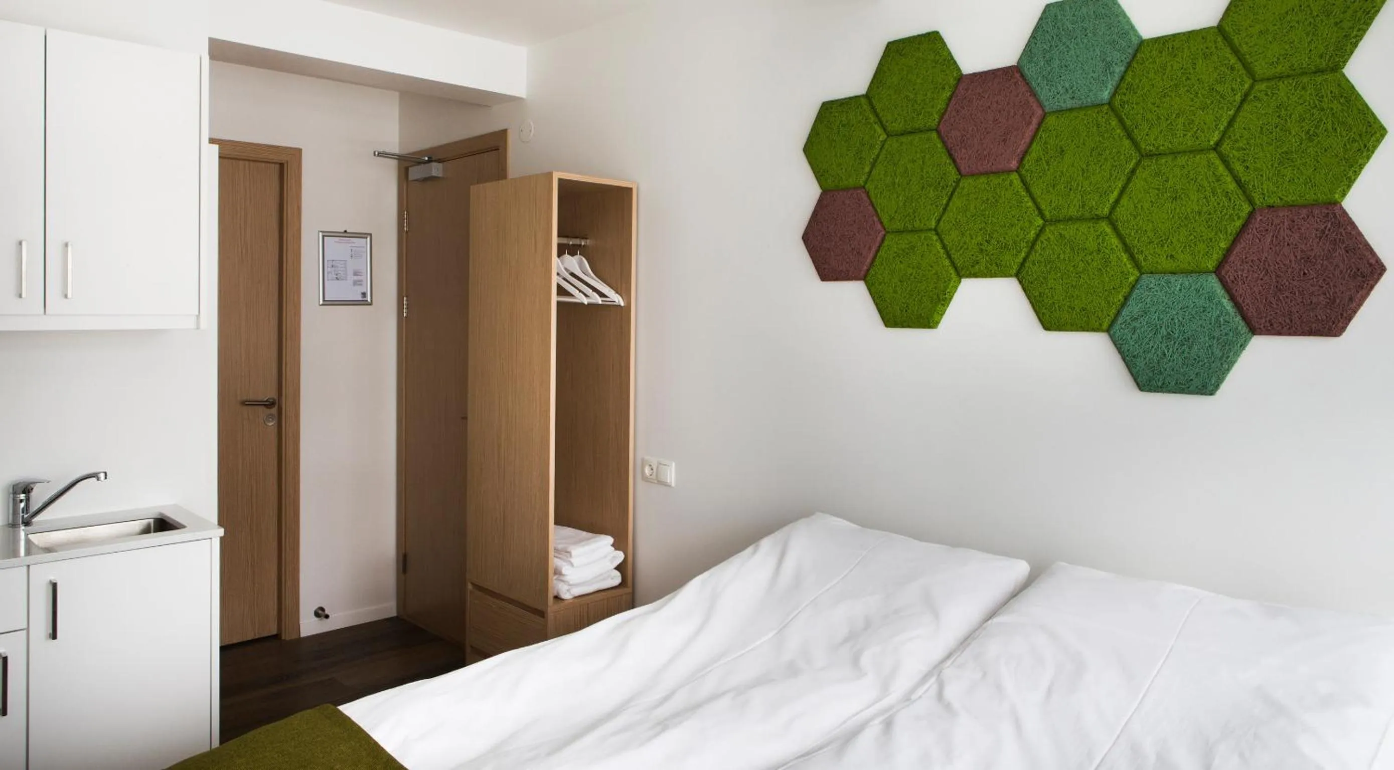 Bed in Island Apartments