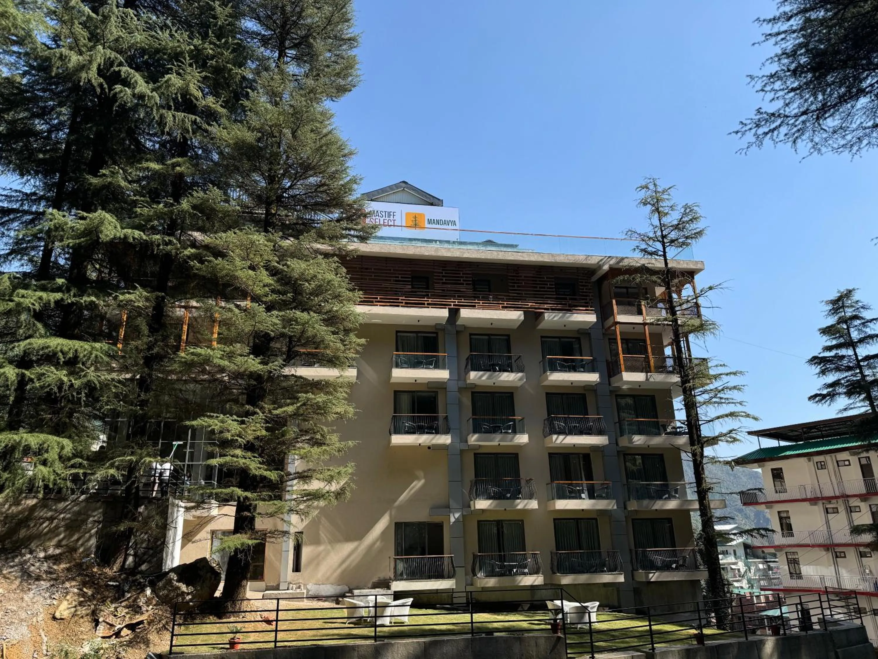 Property building in Mastiff Select Mandavya Dharamkot, McLeodganj