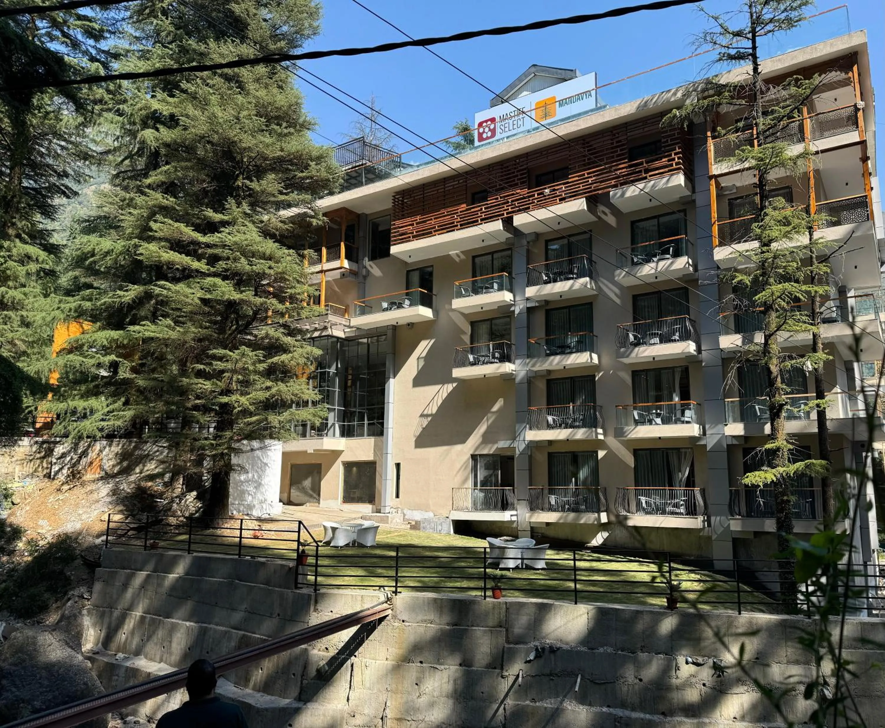 Property building in Mastiff Select Mandavya Dharamkot, McLeodganj