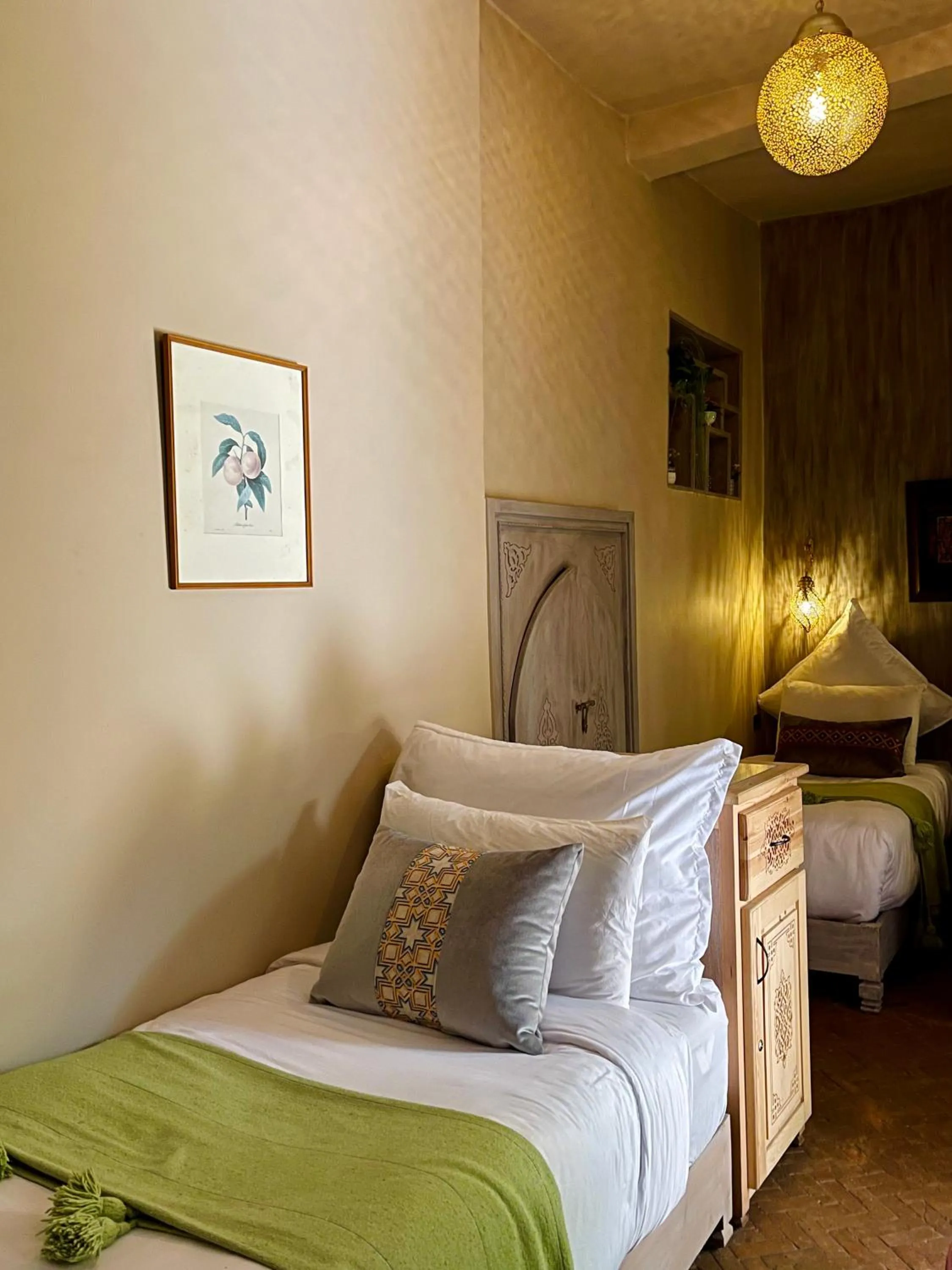Bed in Riad La Calèche