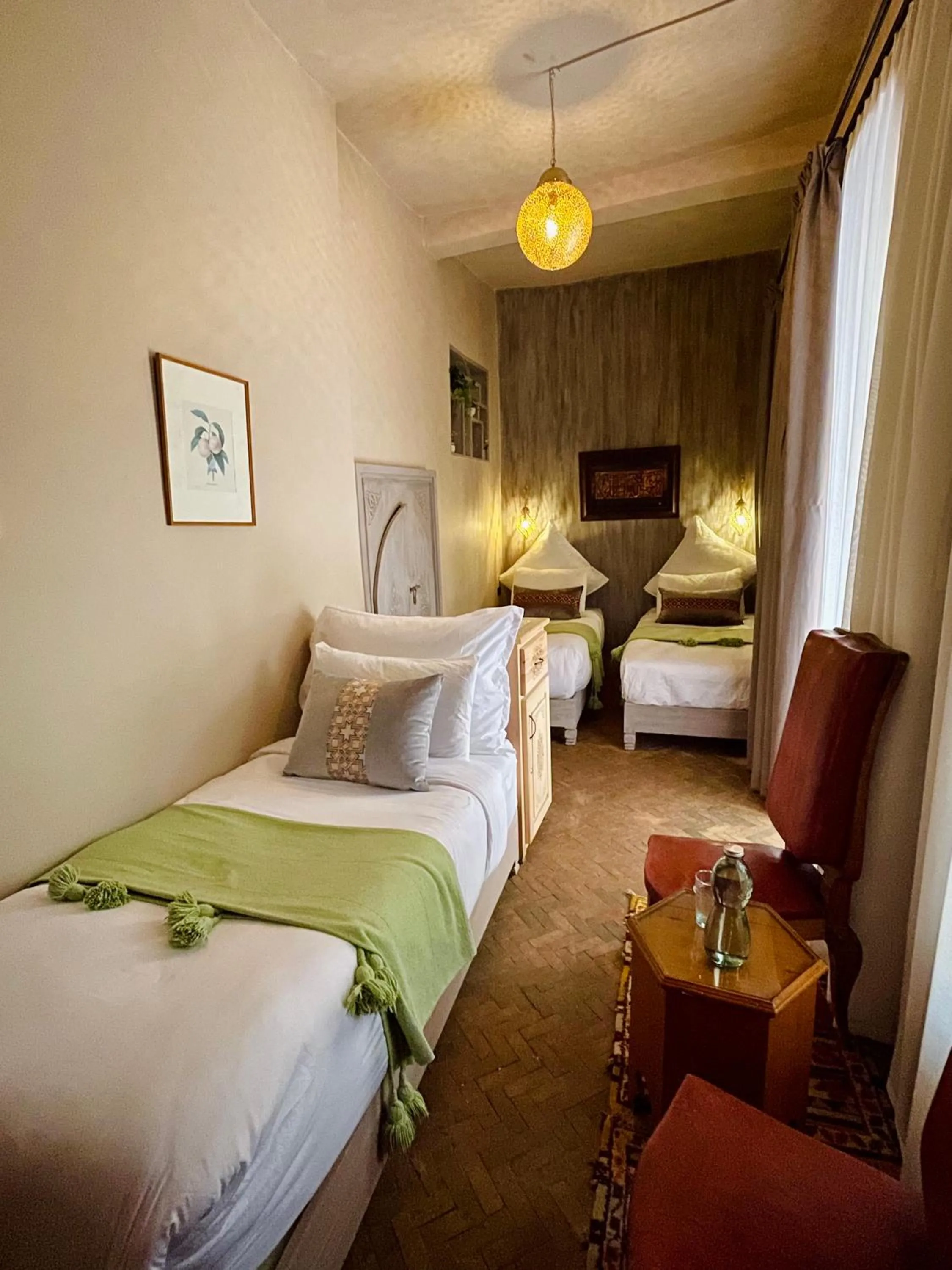 Bed in Riad La Calèche