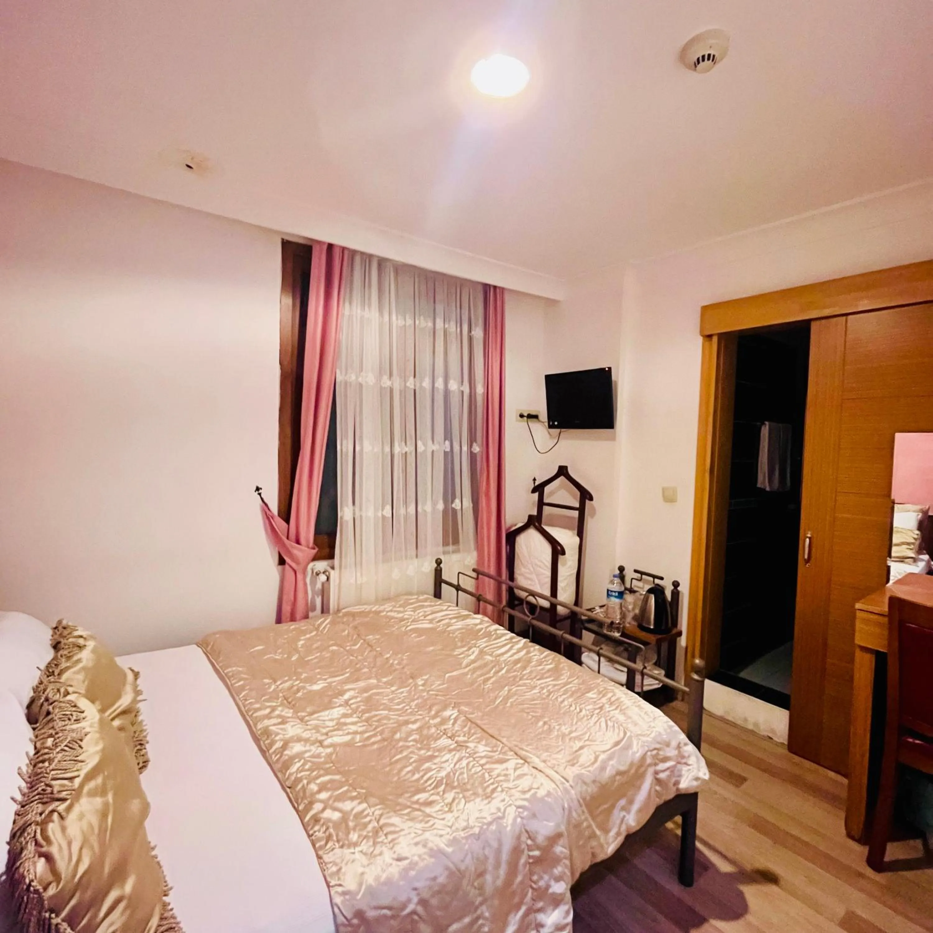 Photo of the whole room, Bed in By Sukru Hotel
