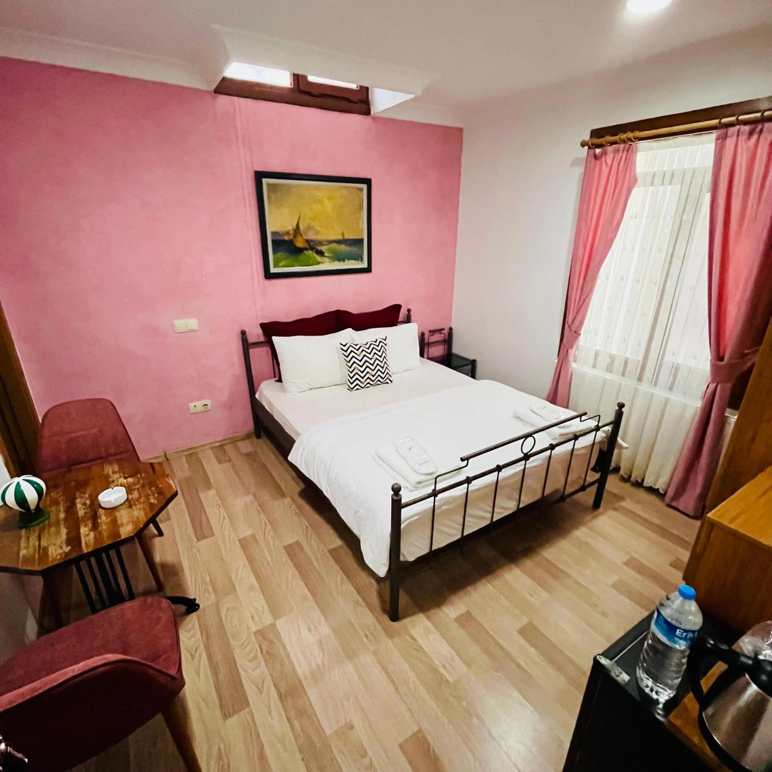 Photo of the whole room, Bed in By Sukru Hotel
