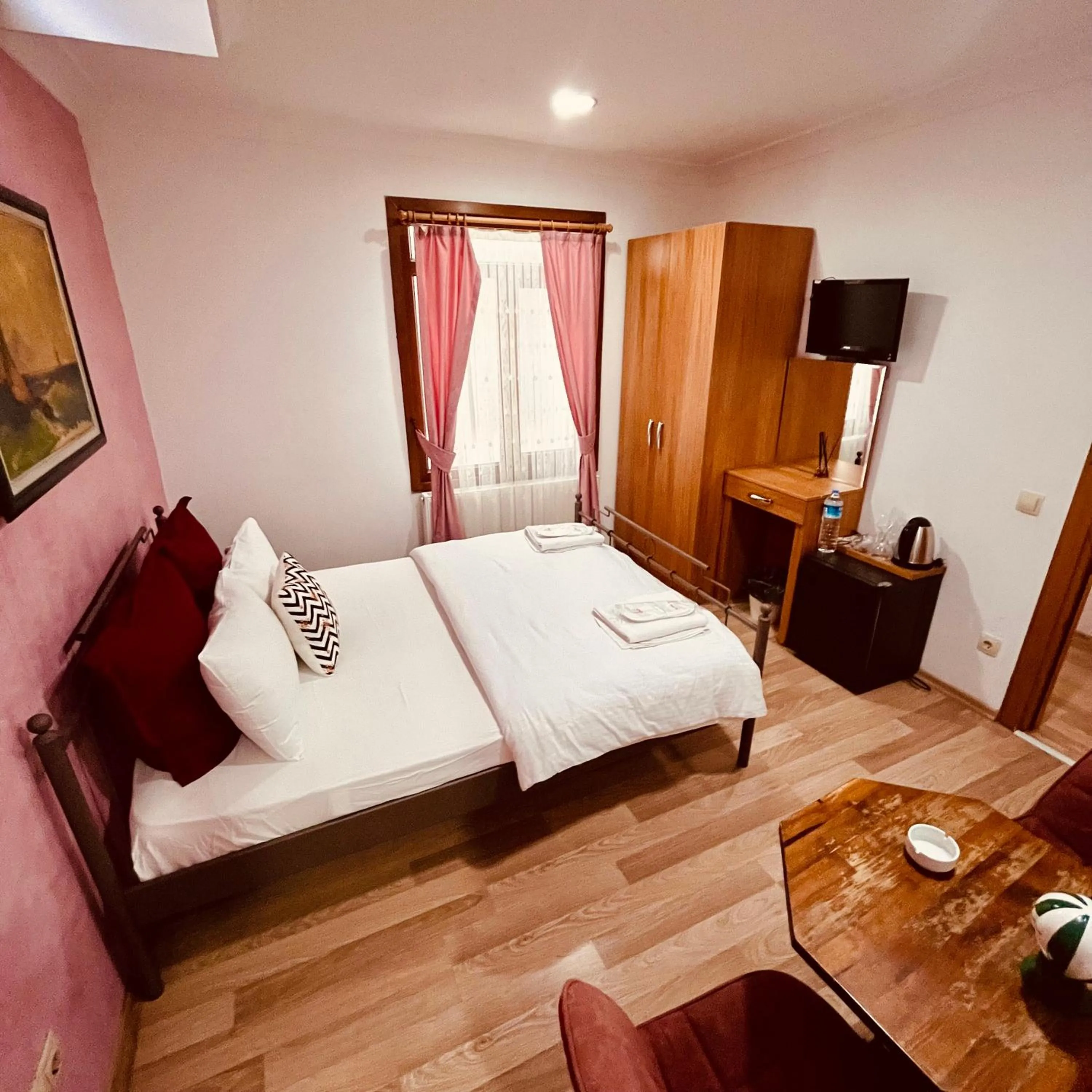 Photo of the whole room, Bed in By Sukru Hotel