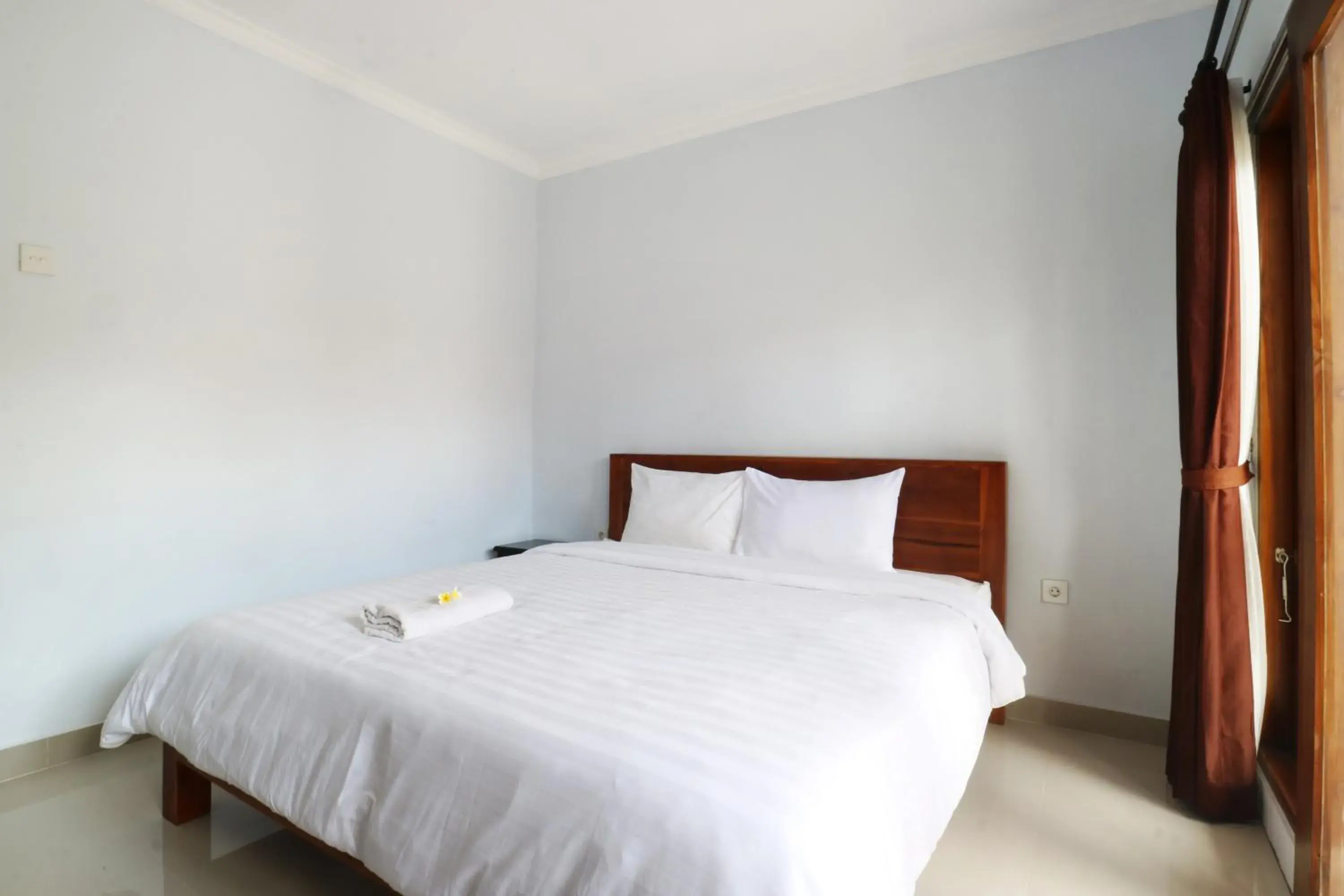 Bedroom, Bed in The Wina Echo Beach Guest House Bedroom, Bed in The Wina Echo Beach Guest House