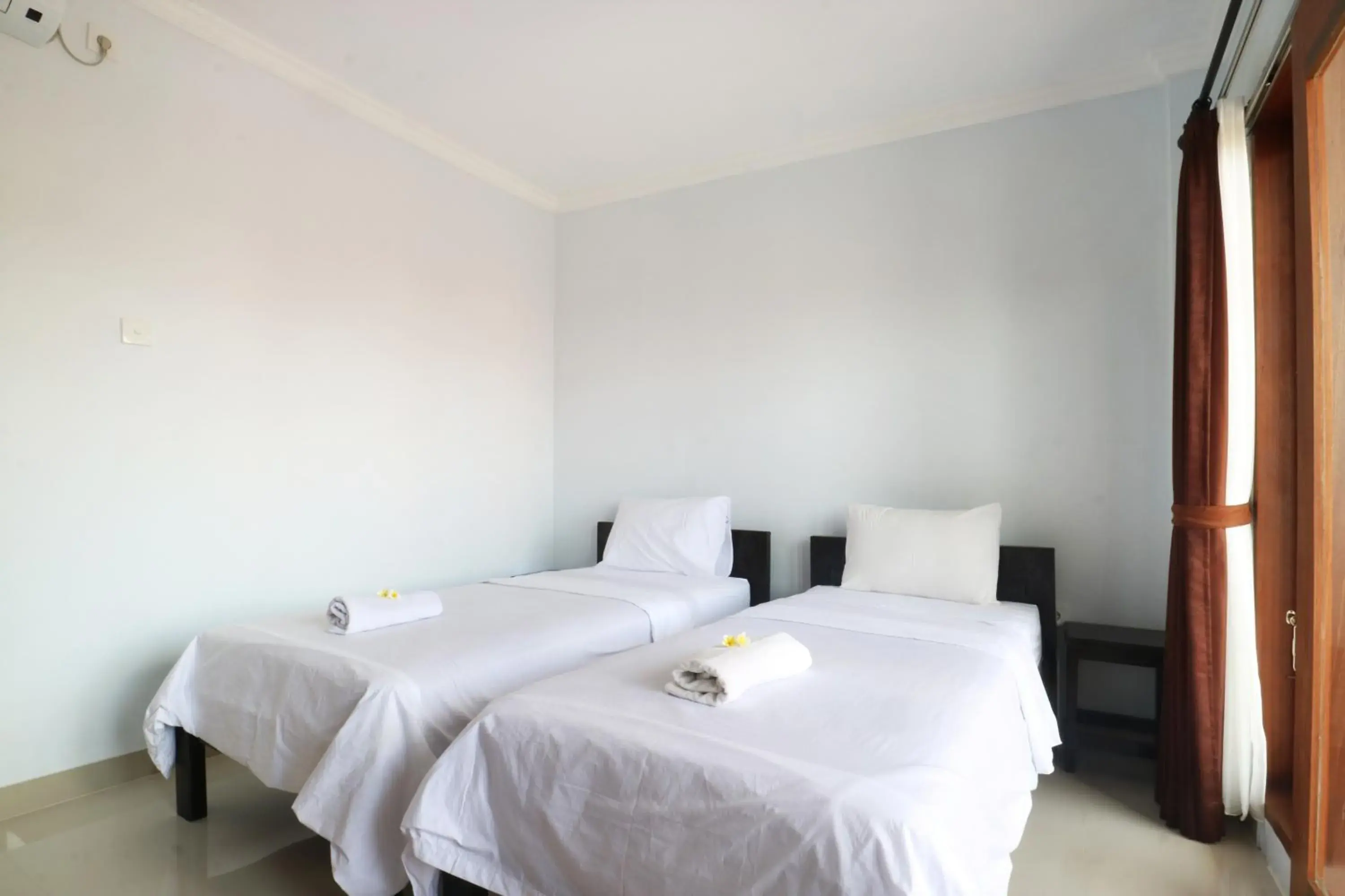 Bedroom, Bed in The Wina Echo Beach Guest House Bedroom, Bed in The Wina Echo Beach Guest House