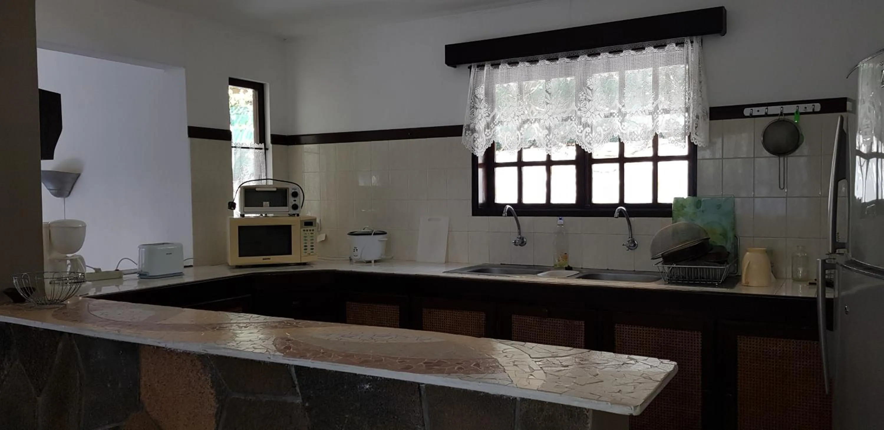 Kitchen or kitchenette in Colibri Beach Villas