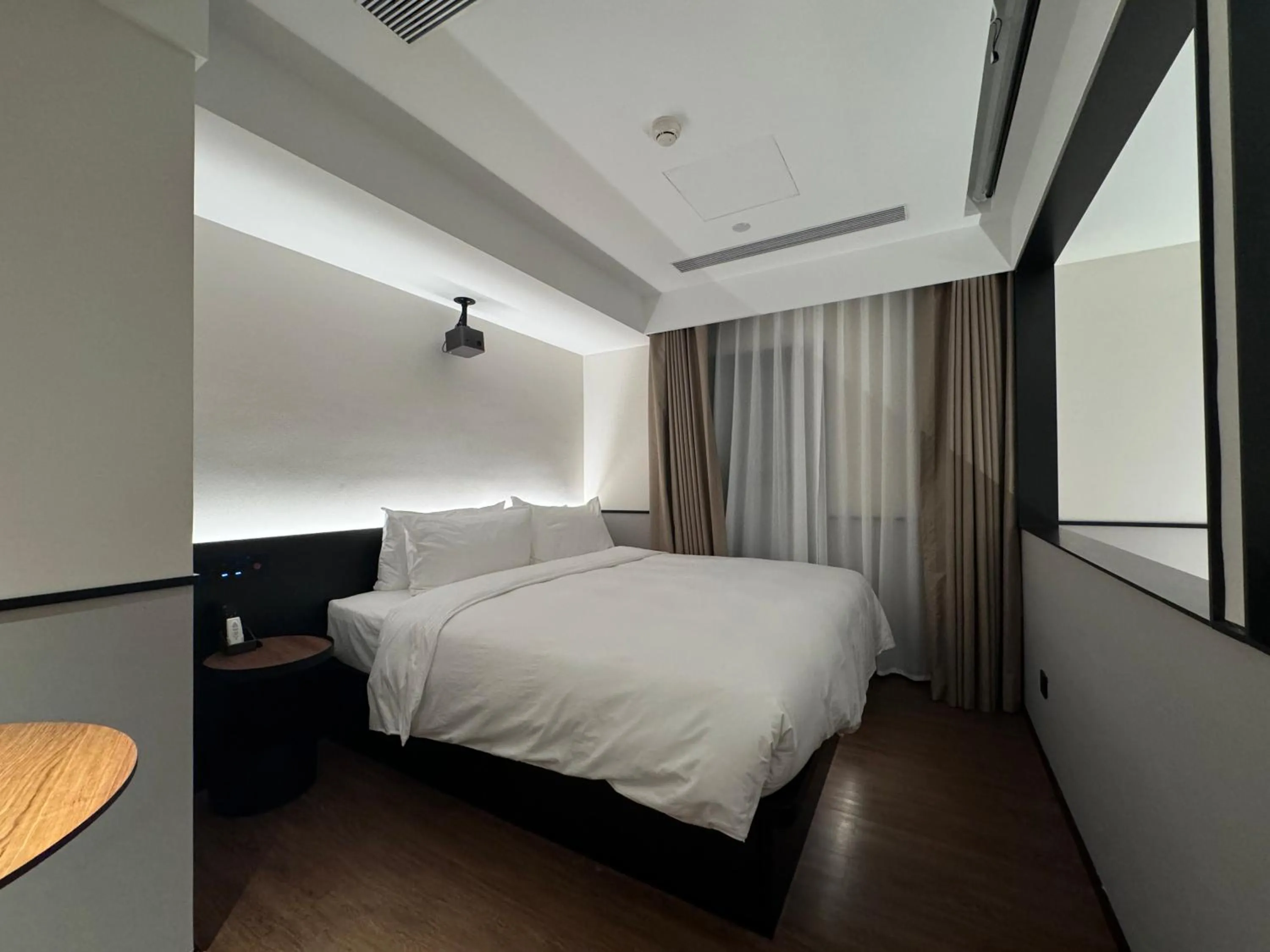 Bed in Suisse Place Beijing Jinsong Subway Station