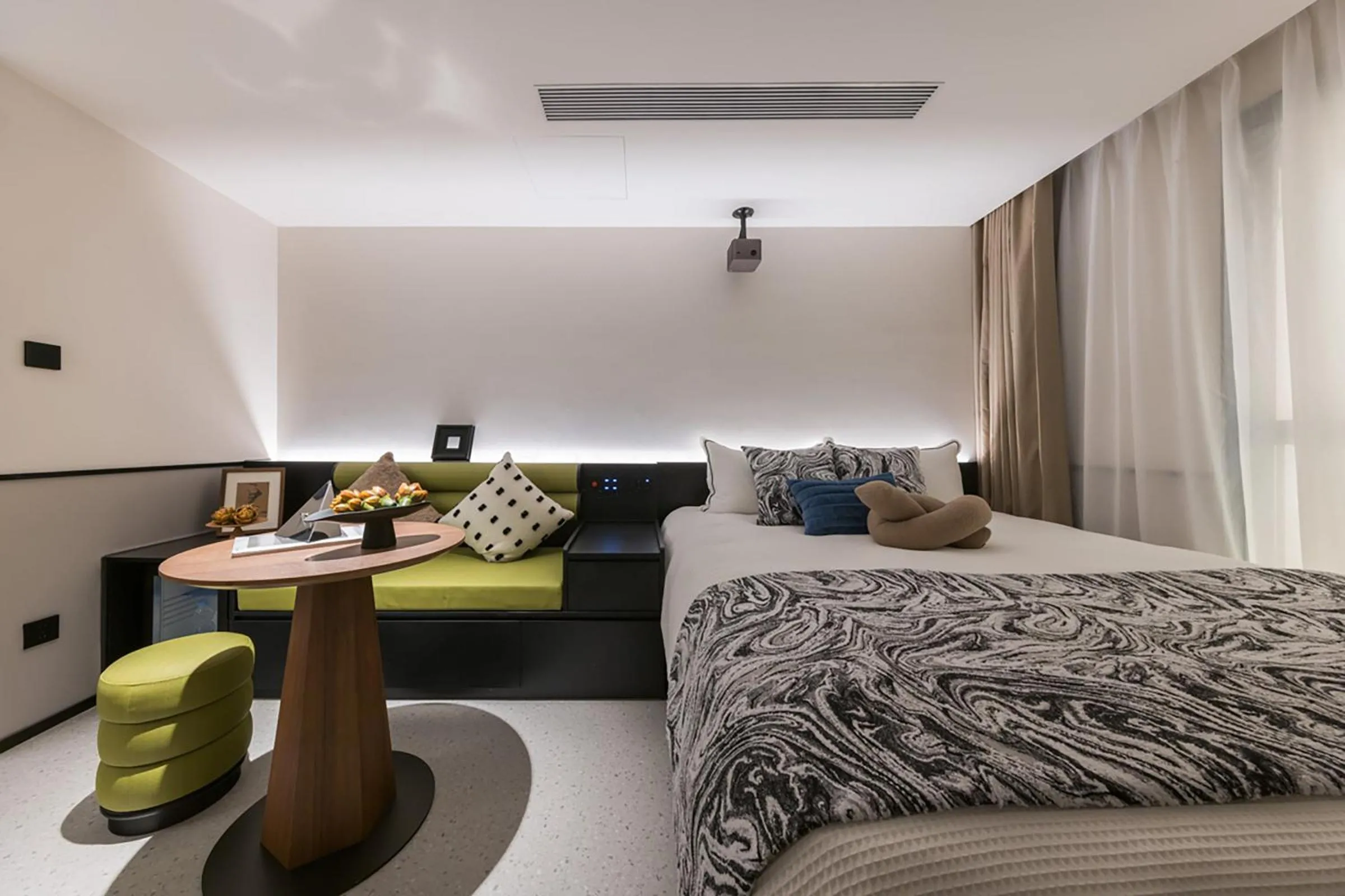 Living room, Bed in Suisse Place Beijing Jinsong Subway Station