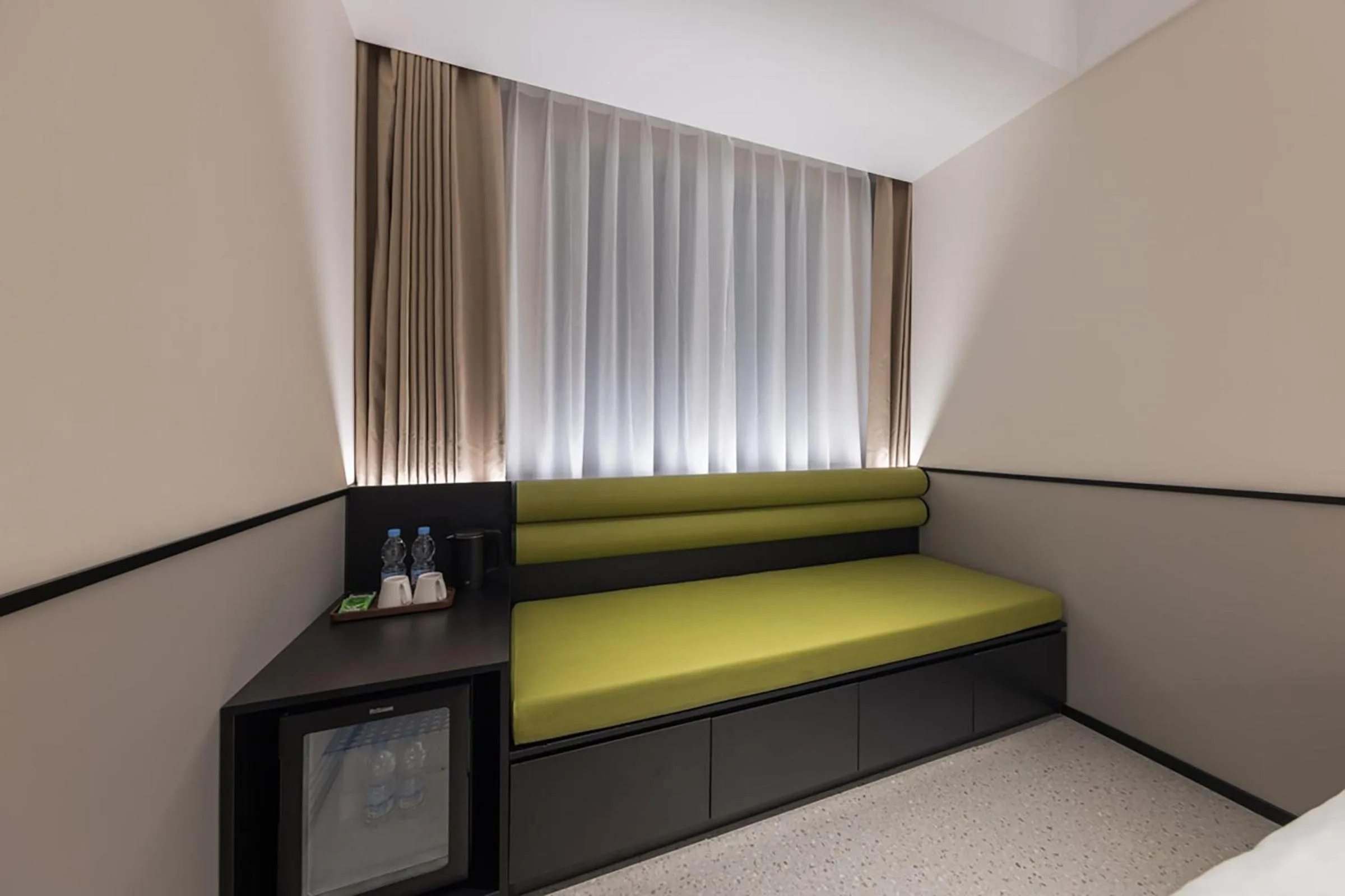 Living room, Bed in Suisse Place Beijing Jinsong Subway Station
