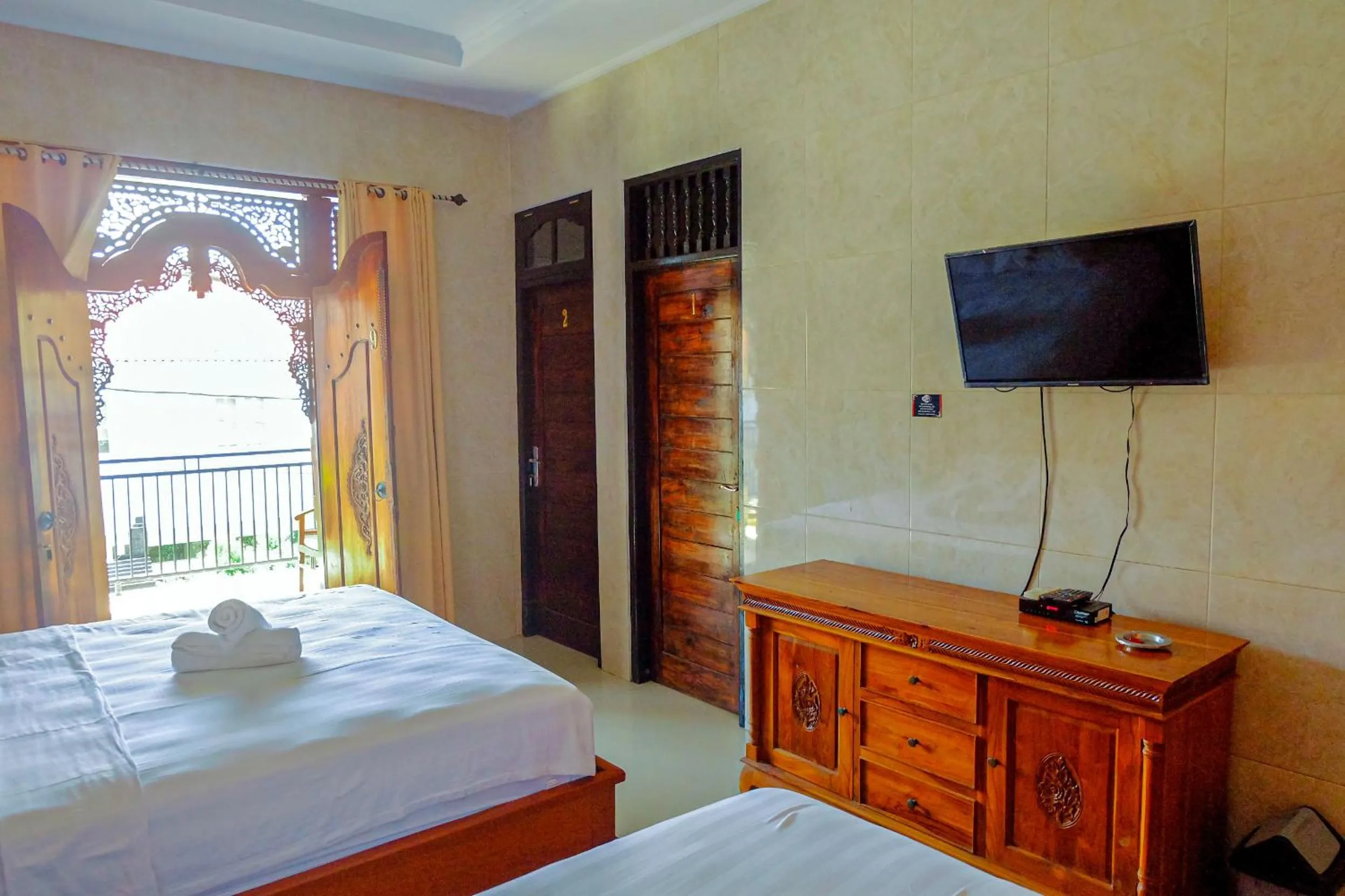Bed in Adi Homestay
