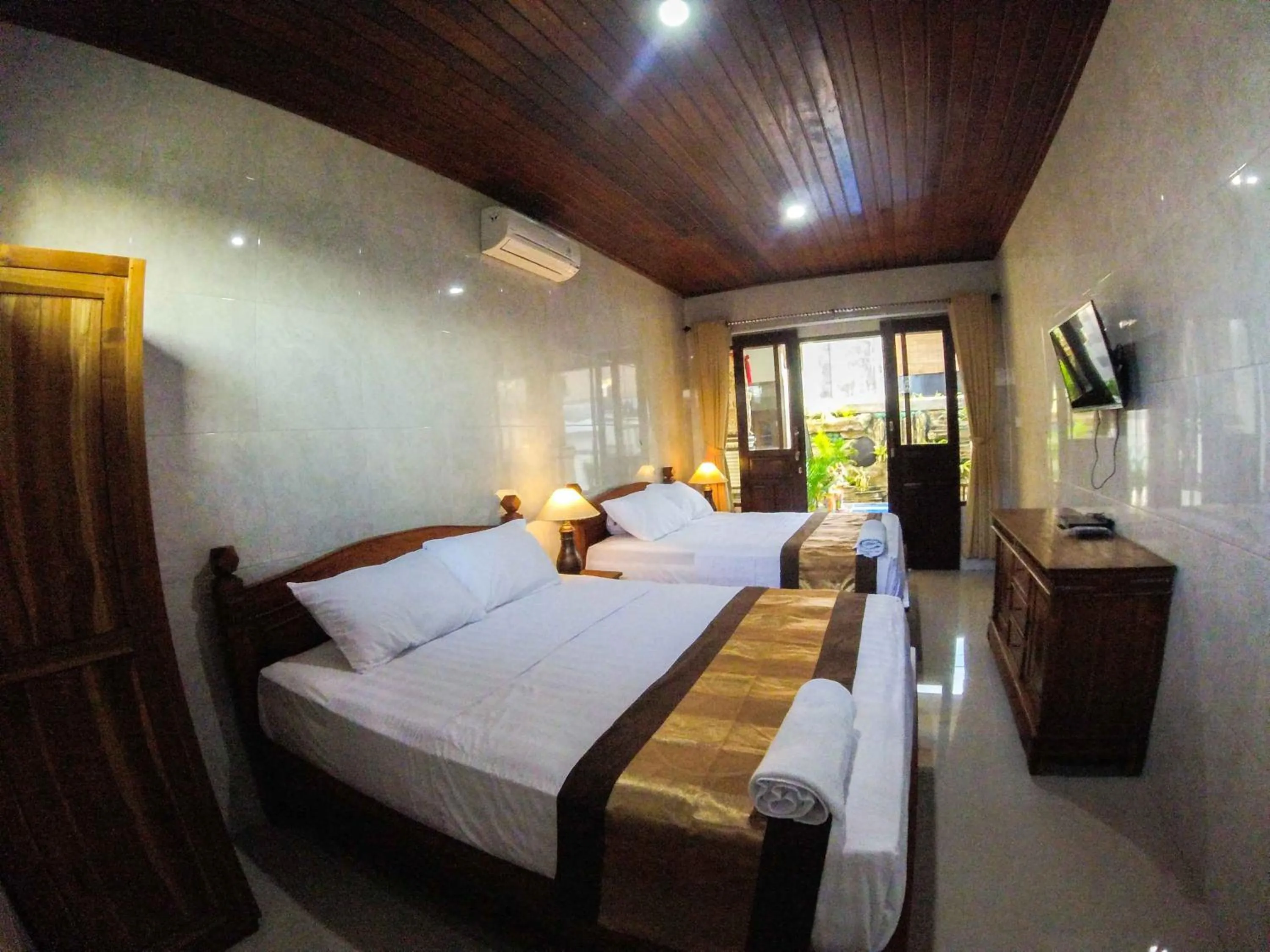 Bed in Adi Homestay
