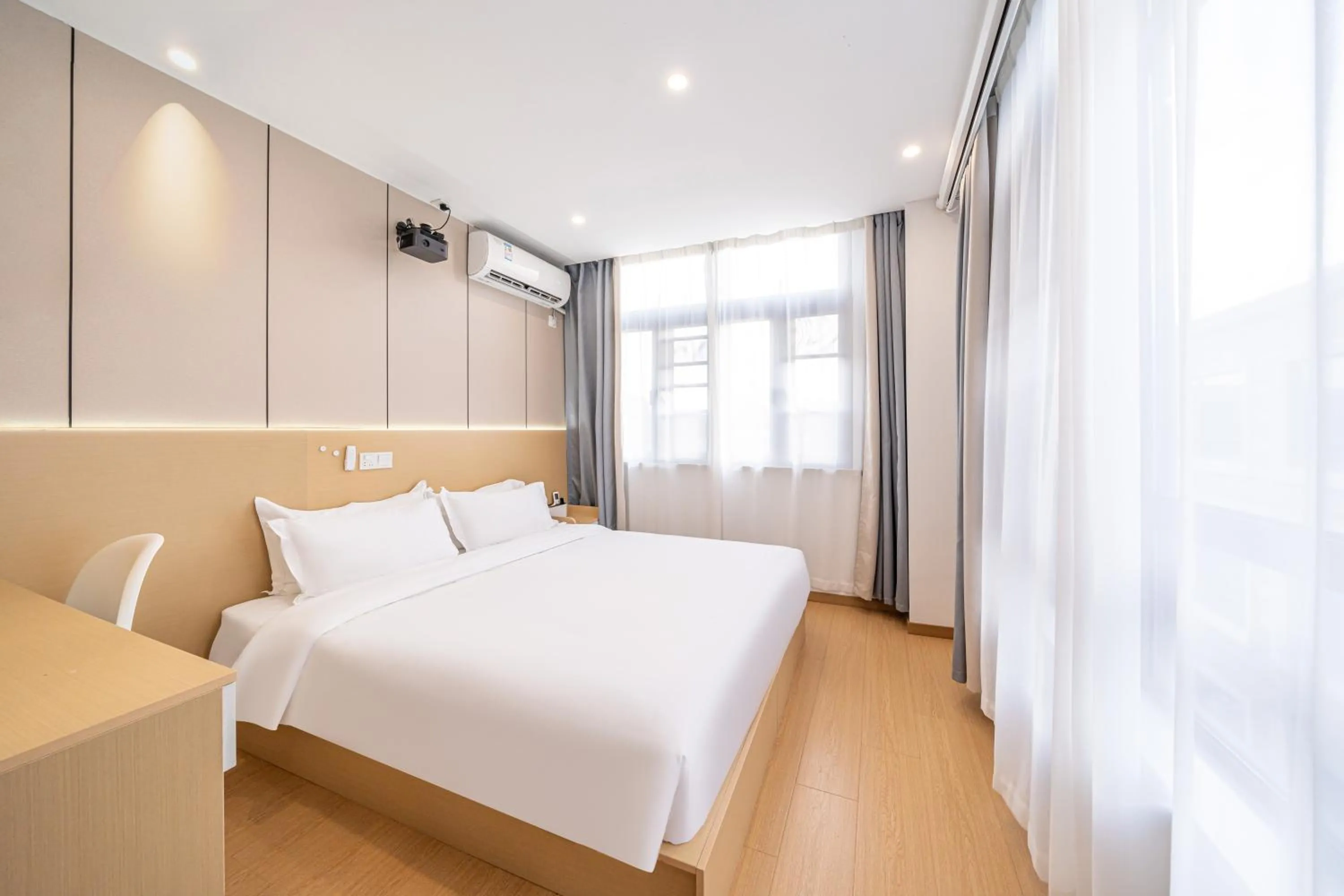Bed in Shanghai Chuxin Qicheng Hotel Shanghai International Tourism Resort