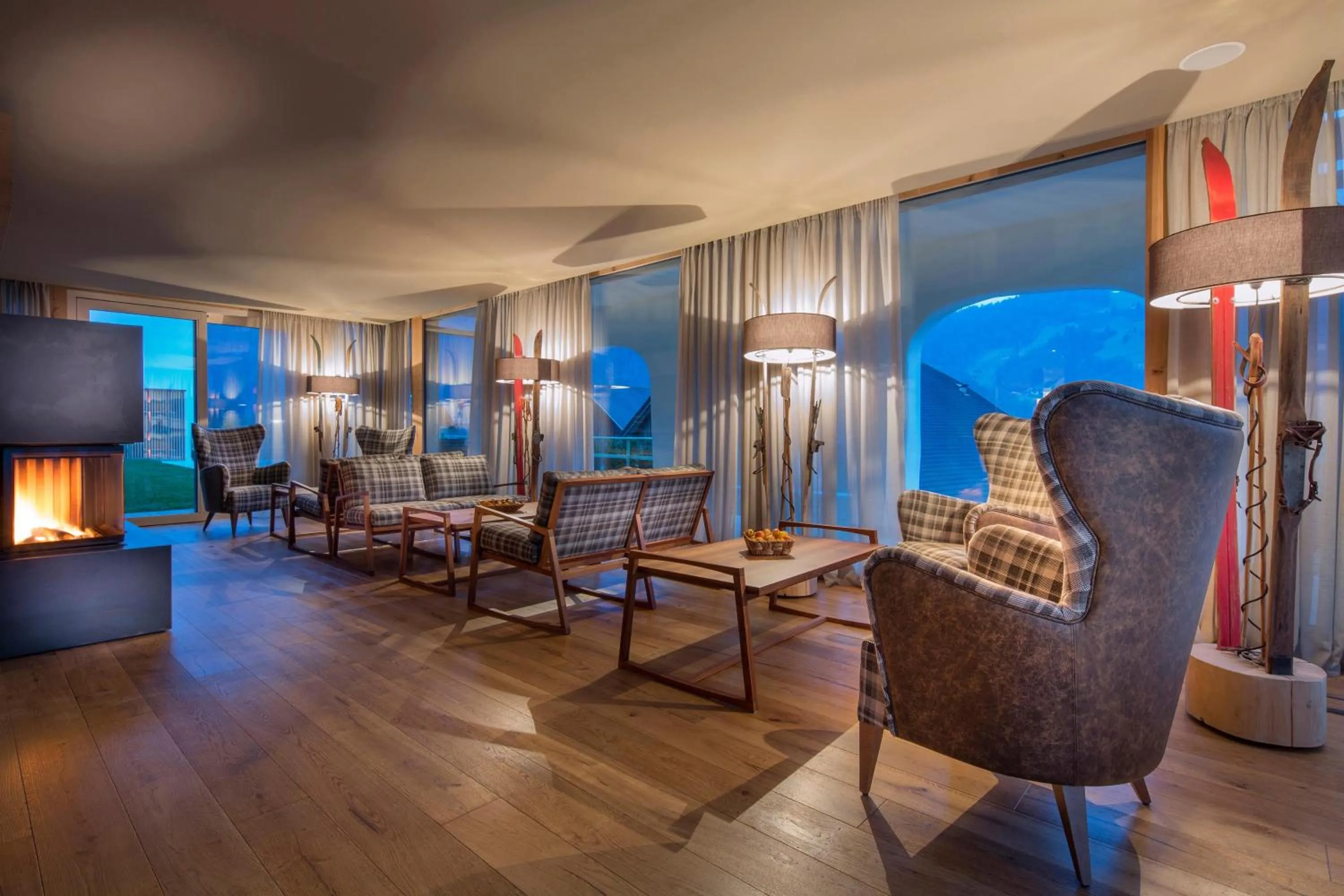 Communal lounge/ TV room in Mölgg Dolomites Residence