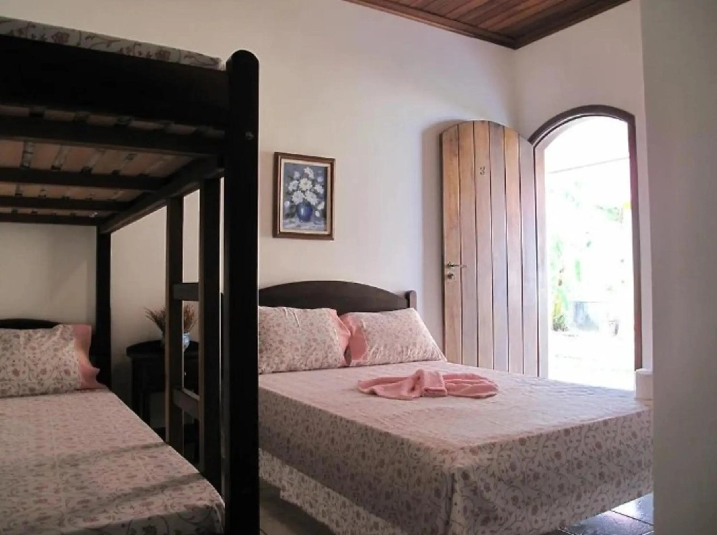 Bed in Pousada Atelier Aly da Costa