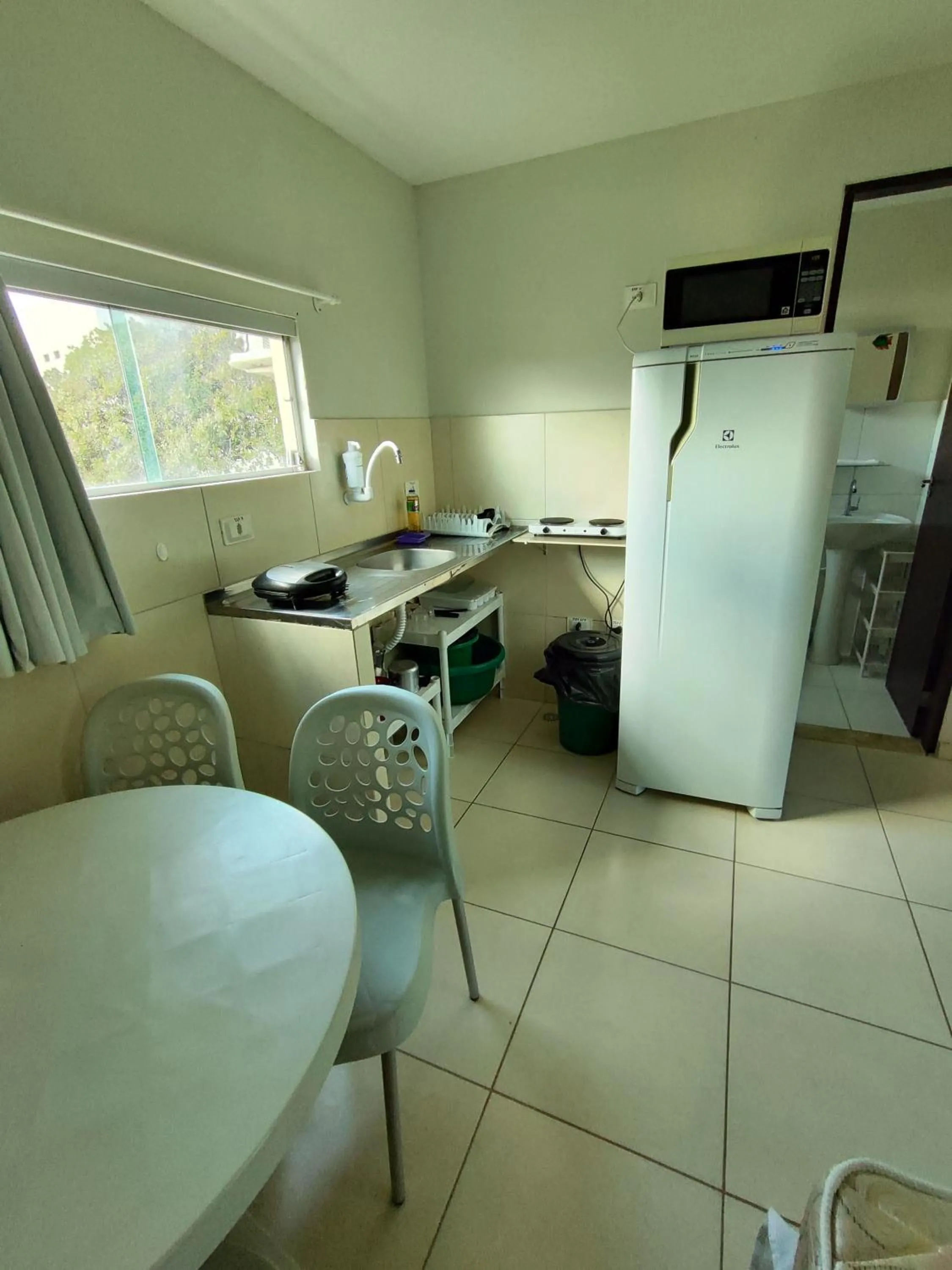 Kitchen or kitchenette in Divinos Flat Carneiros