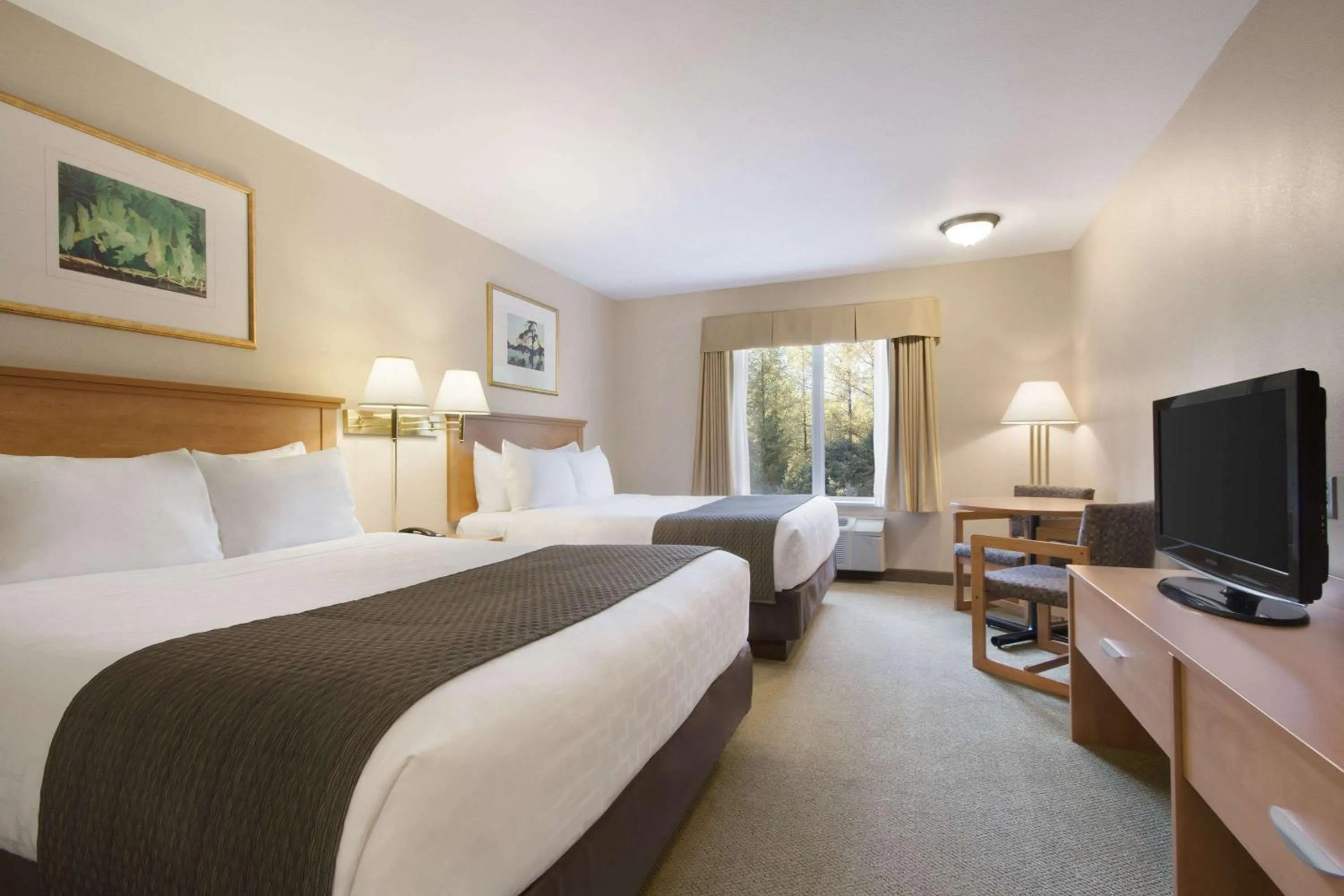 Photo of the whole room, Bed in Days Inn & Suites by Wyndham Thunder Bay