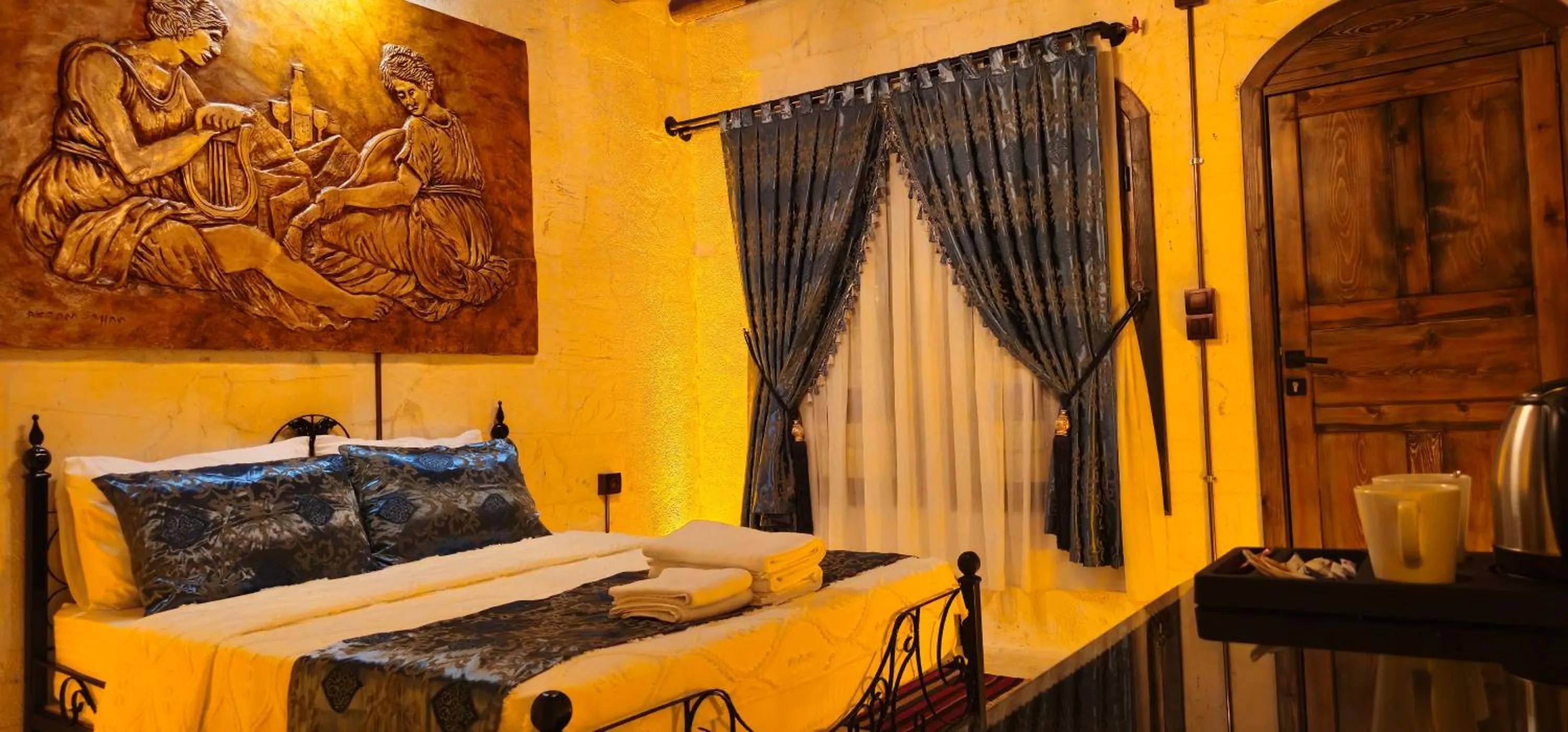 Bed in Cleopatra Antique Hotel