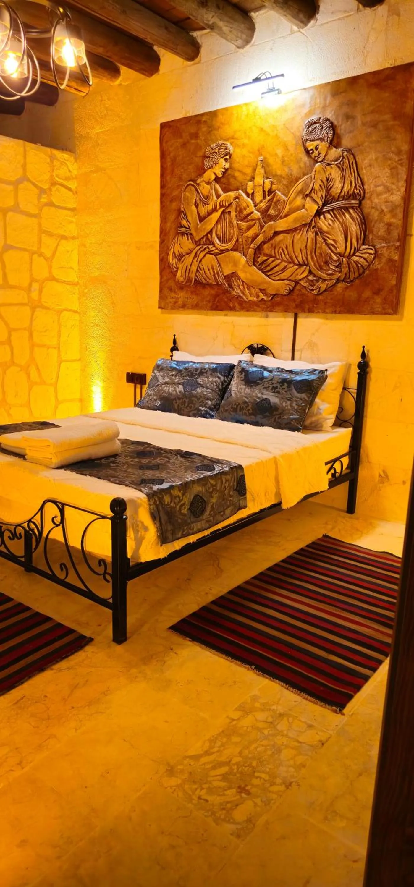 Bed in Cleopatra Antique Hotel