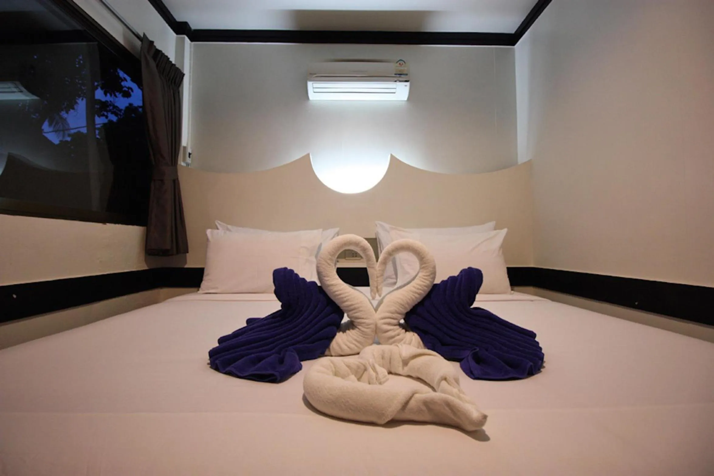 Bed in Simple Life Talay & Divers Resort