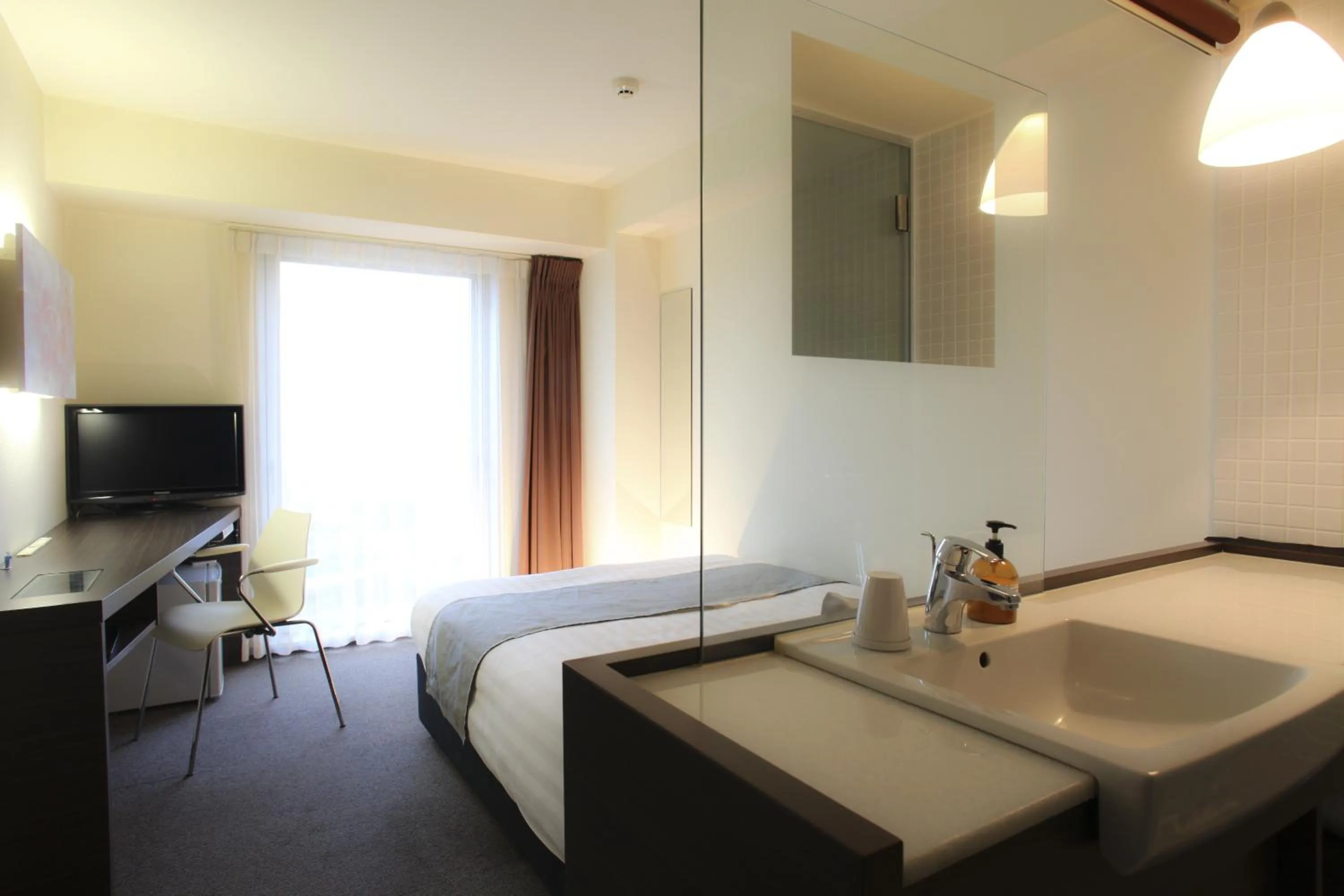 Bedroom, Bed in KOKO HOTEL Numazu Inter