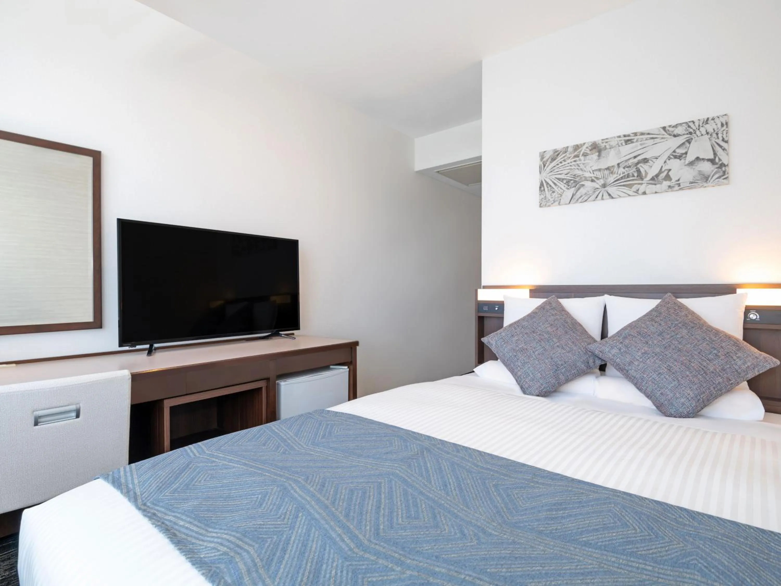 Photo of the whole room, Bed in ART HOTEL Miyazaki Sky Tower